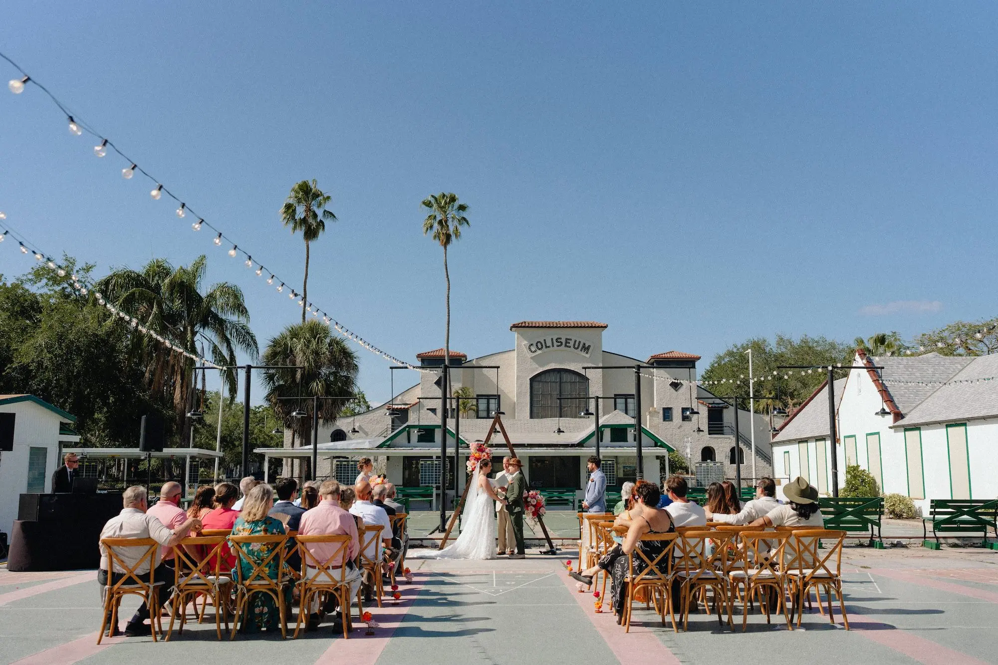 24Colorful Pink Yellow Orange Florida Wedding Inspiration St Petersburg Venue Shuffleboard Club - Whimsical, Colorful Outdoor Wedding | St. Pete Shuffleboard Club Colorful Pink, Yellow, and Orange Florida Wedding Ceremony Decor Inspiration | St Pete Event Venue Shuffleboard Club | Planner Wilder Mind Events