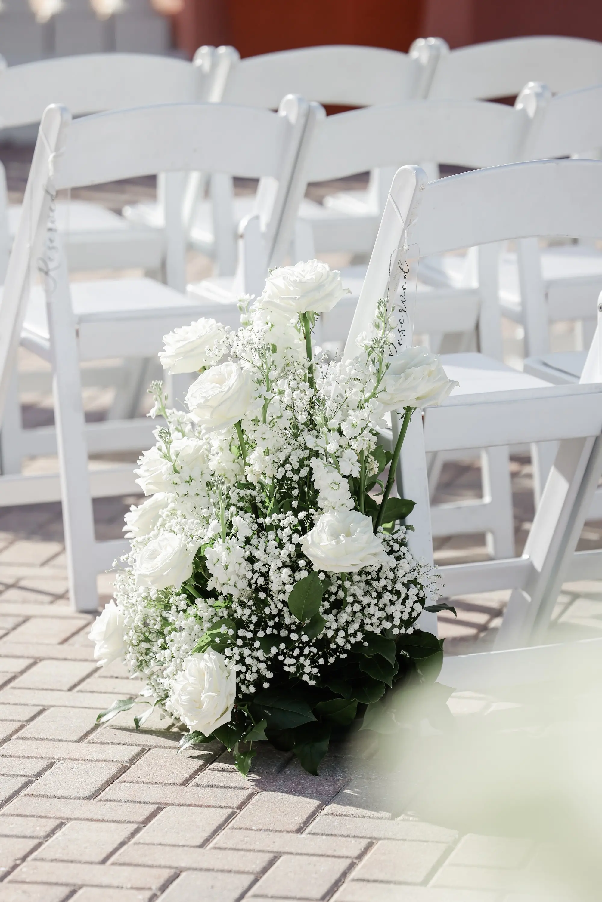 27Classic White Florida Wedding Ideas - Classic, White Rooftop Wedding | Hyatt Regency Clearwater Beach Monochromatic White Roses with Baby's Breath Wedding Ceremony Aisle Decor Inspiration | White Ceremony Chairs Ideas | Tampa Bay Planner Planner Coastal Coordinating | St Pete Rentals Gabro Event Services
