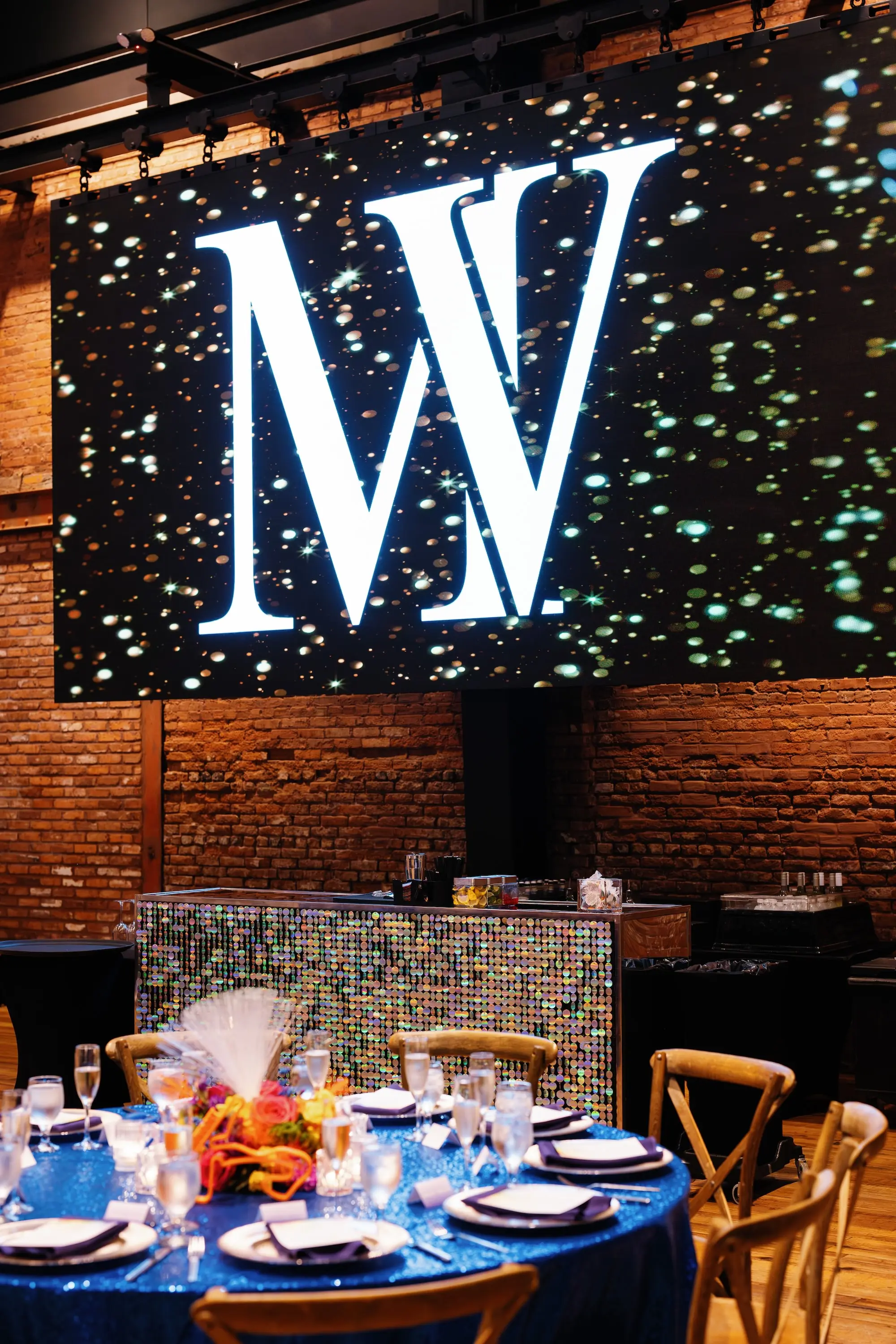 27Whimsical Rainbow Inspired Wedding Ideas - “Best Of” 2025: Wedding Receptions Part 2 Bright Colorful Rainbow Wedding Reception Decor Inspiration | Blue Sequined Table Cloth Ideas | Over The Top Rental Linens | Event Planner Unique Weddings and Events | Industrial Tampa Wedding Venue Armature Works | Tabletop Rentals A Chair Affair
