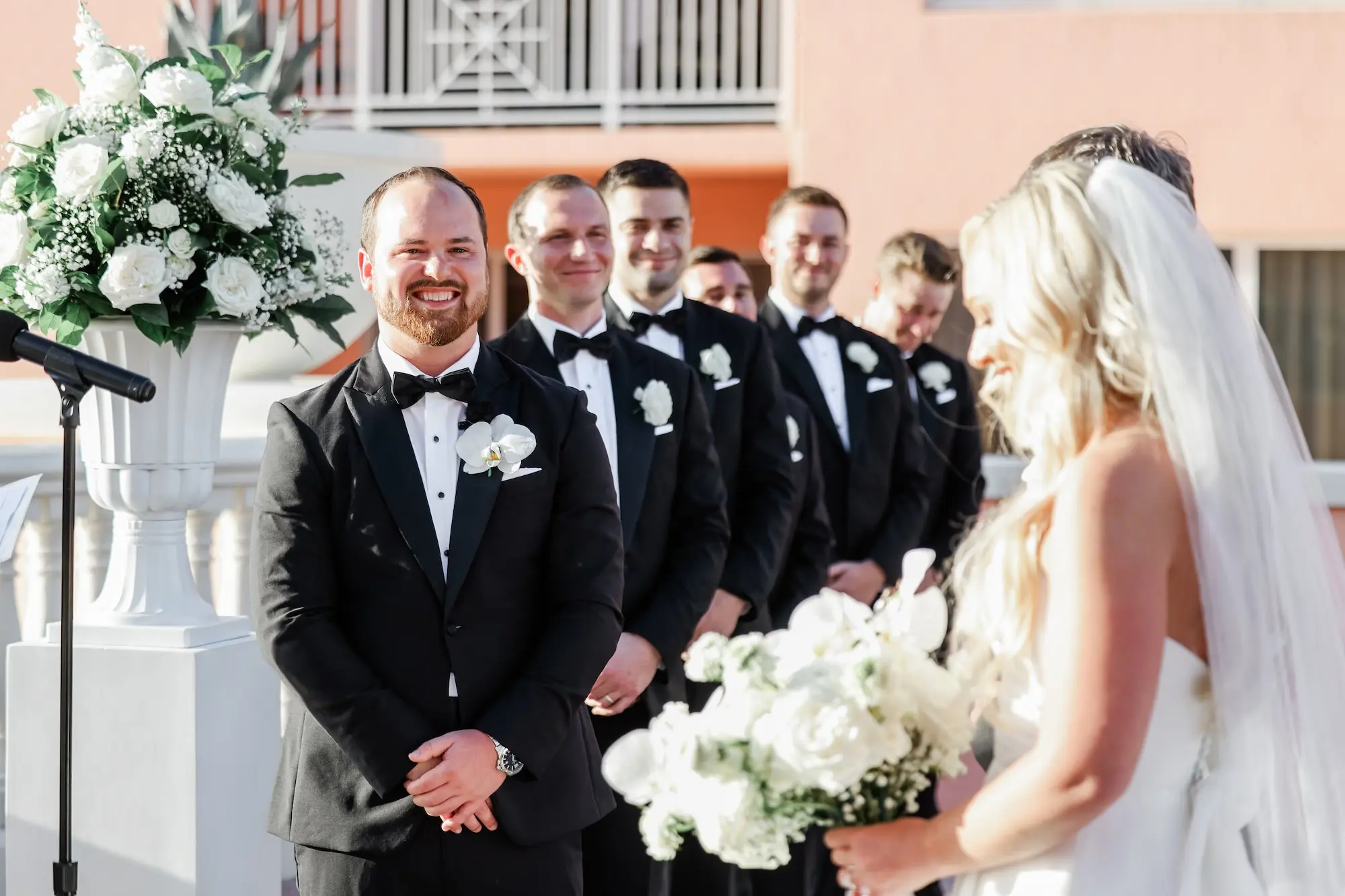 29Classic White Florida Wedding Ideas - Classic, White Rooftop Wedding | Hyatt Regency Clearwater Beach Groom's Reaction to Bride Walking Down Wedding Ceremony Aisle | Tampa Bay Photographer Lifelong Photography Studio