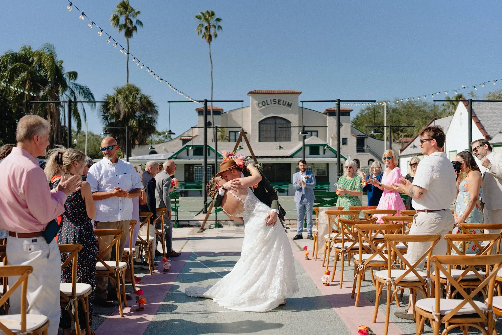 29Colorful Pink Yellow Orange Florida Wedding Inspiration - Whimsical, Colorful Outdoor Wedding | St. Pete Shuffleboard Club Bride and Groom Just Married Wedding Portrait