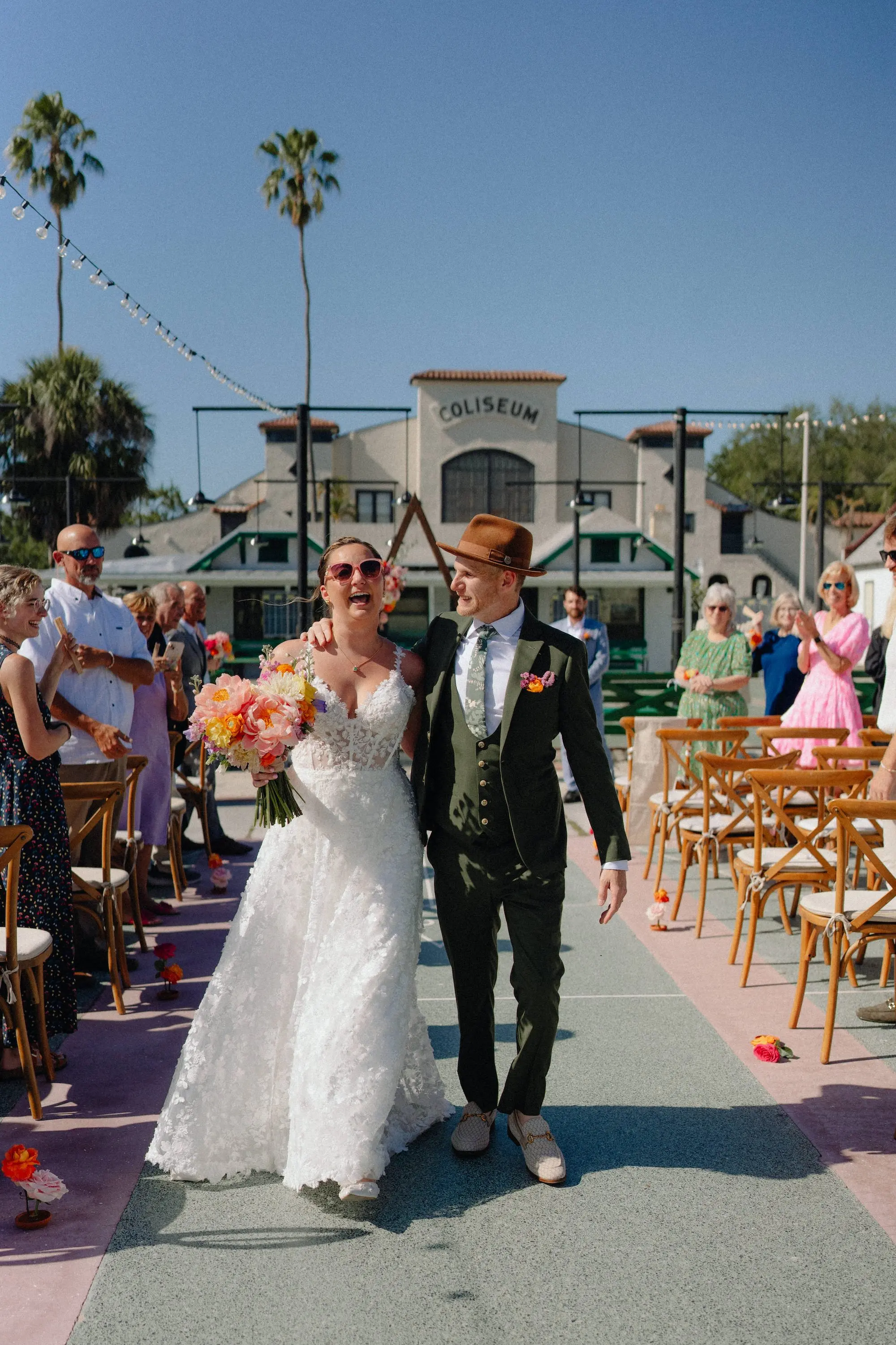 30Colorful Pink Yellow Orange Florida Wedding Inspiration - Whimsical, Colorful Outdoor Wedding | St. Pete Shuffleboard Club Bride and Groom Just Married Wedding Portrait