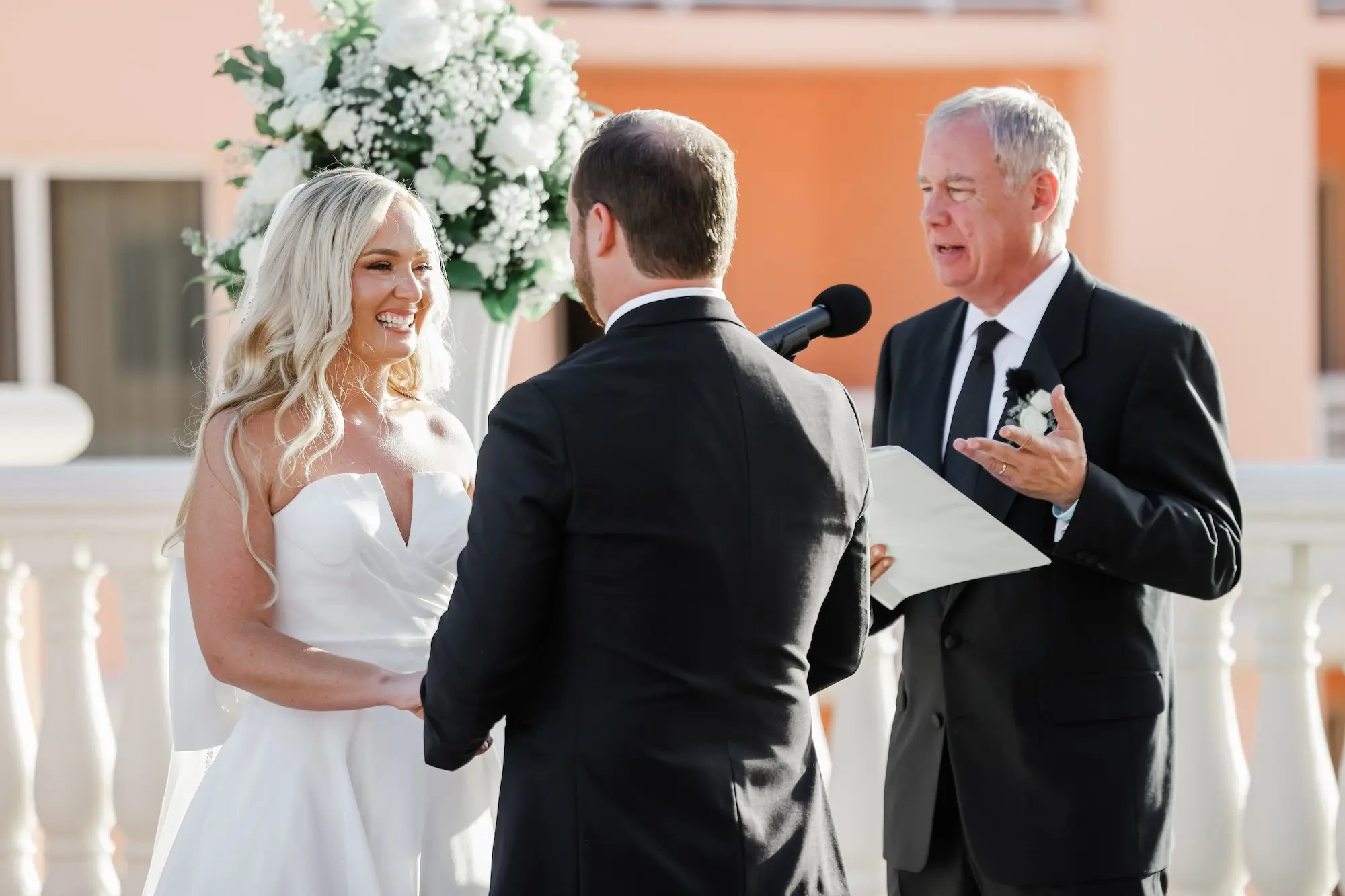 31Classic White Florida Wedding Ideas - Classic, White Rooftop Wedding | Hyatt Regency Clearwater Beach Bride and Groom Wedding Ceremony Vow Exchange Wedding Portrait | Tampa Bay Photographer Lifelong Photography Studio