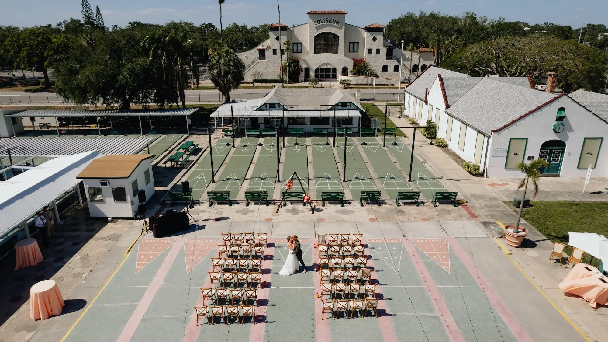 31Colorful Pink Yellow Orange Florida Wedding Inspiration St Petersburg Venue Shuffleboard Club - Whimsical, Colorful Outdoor Wedding | St. Pete Shuffleboard Club Tampa Bay Wedding Venue St Petersburg Shuffleboard Club
