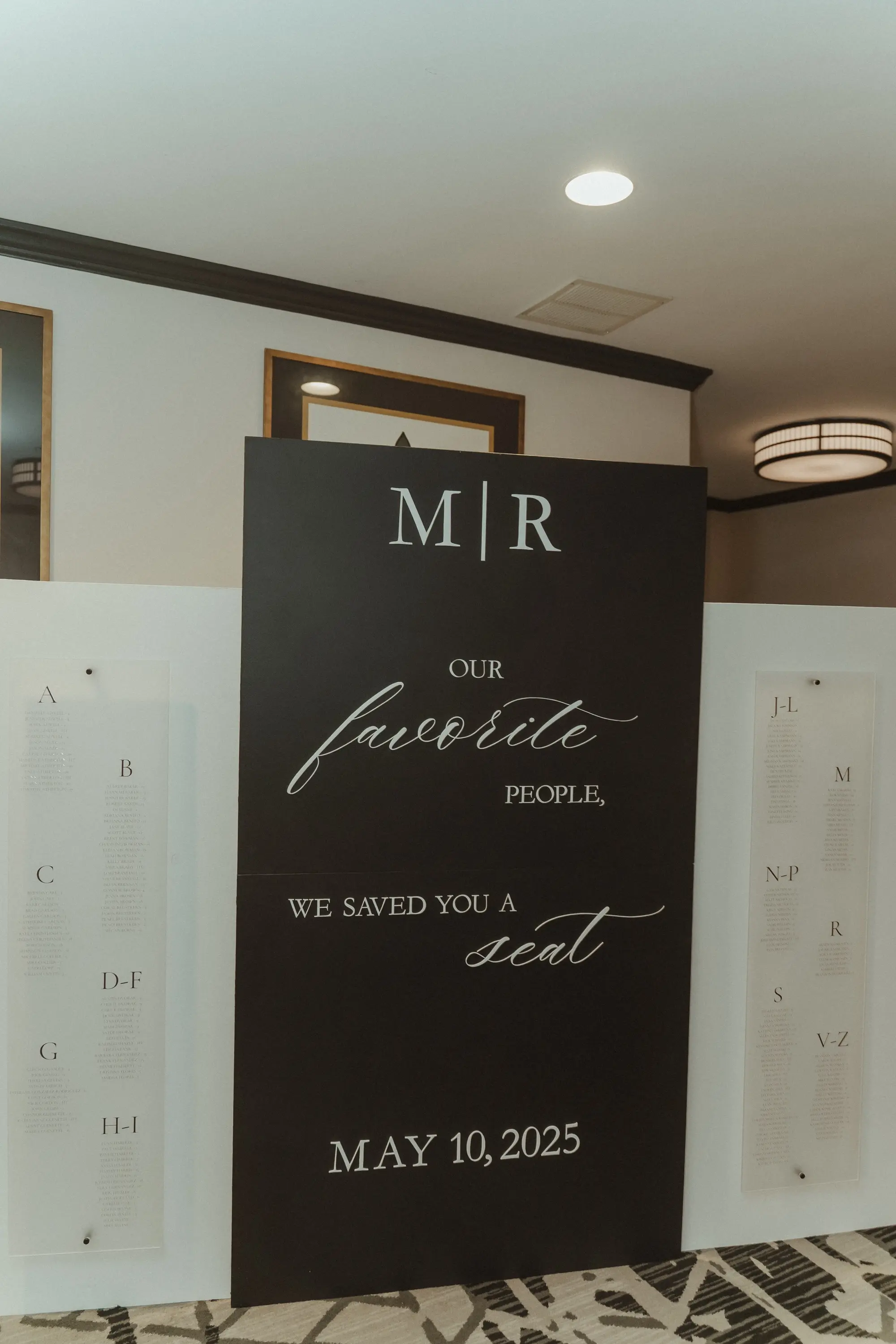 31Sophiscated Black and White Wedding Inspiration - “Best Of” 2025: Wedding Receptions Part 2 Modern Chic Black and White Wedding Reception Seating Chart Display Decor Ideas | Tampa Bay Planner The Olive Tree Weddings