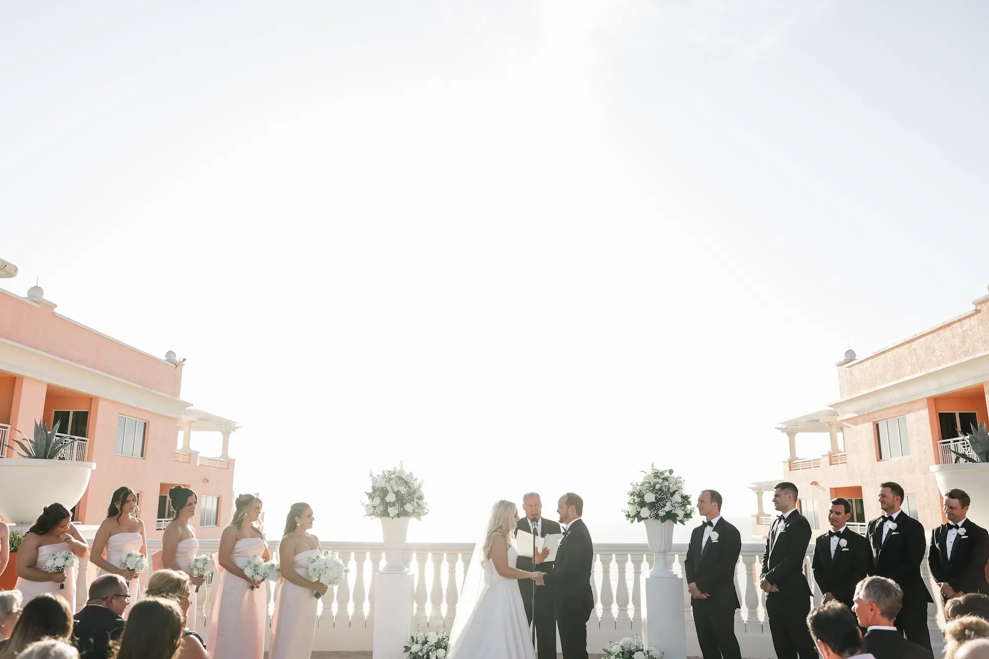 32Classic White Florida Wedding Ideas - Classic, White Rooftop Wedding | Hyatt Regency Clearwater Beach Bride and Groom Wedding Oceanview Ceremony Vow Exchange Wedding Portrait | Tampa Bay Photographer Lifelong Photography Studio | Florida Wedding Venue Hyatt Regency Clearwater Beach Resort and Spa