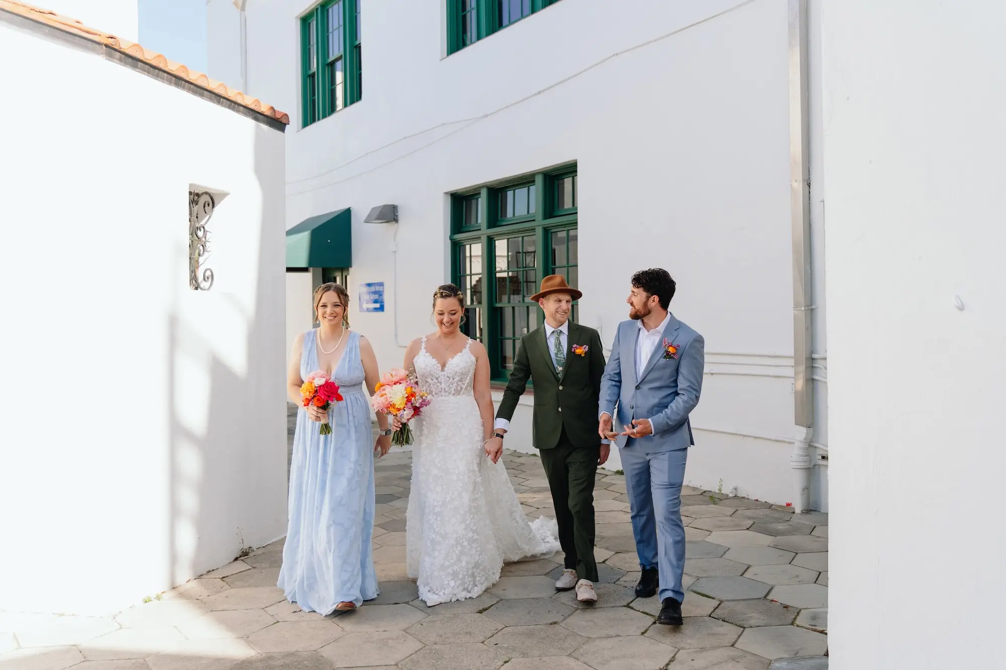 32Colorful Pink Yellow Orange Florida Wedding Inspiration - Whimsical, Colorful Outdoor Wedding | St. Pete Shuffleboard Club Bride and Groom with Bridal Party Wedding Portrait