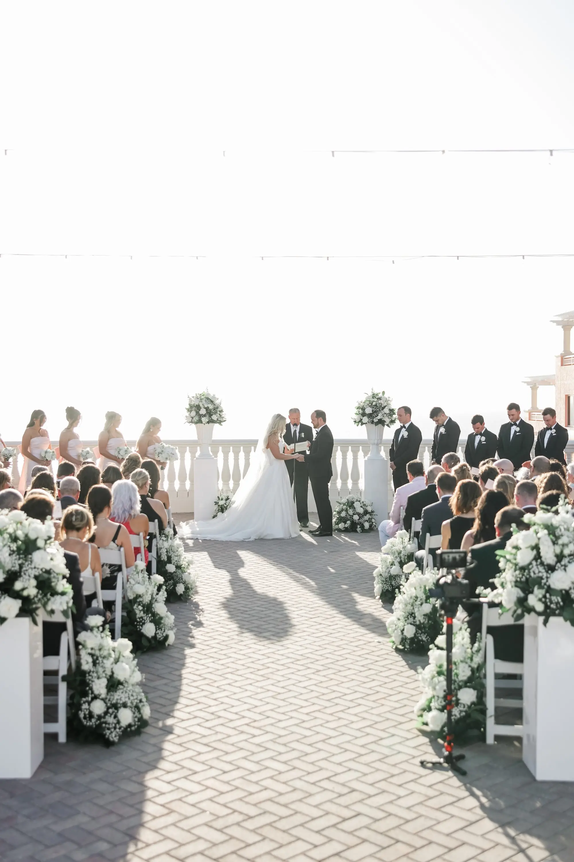 33Classic White Florida Wedding Ideas - Classic, White Rooftop Wedding | Hyatt Regency Clearwater Beach Bride and Groom Wedding Balcony Oceanview Ceremony Vow Exchange Wedding Portrait | Tampa Bay Photographer Lifelong Photography Studio | Florida Wedding Venue Hyatt Regency Clearwater Beach Resort and Spa