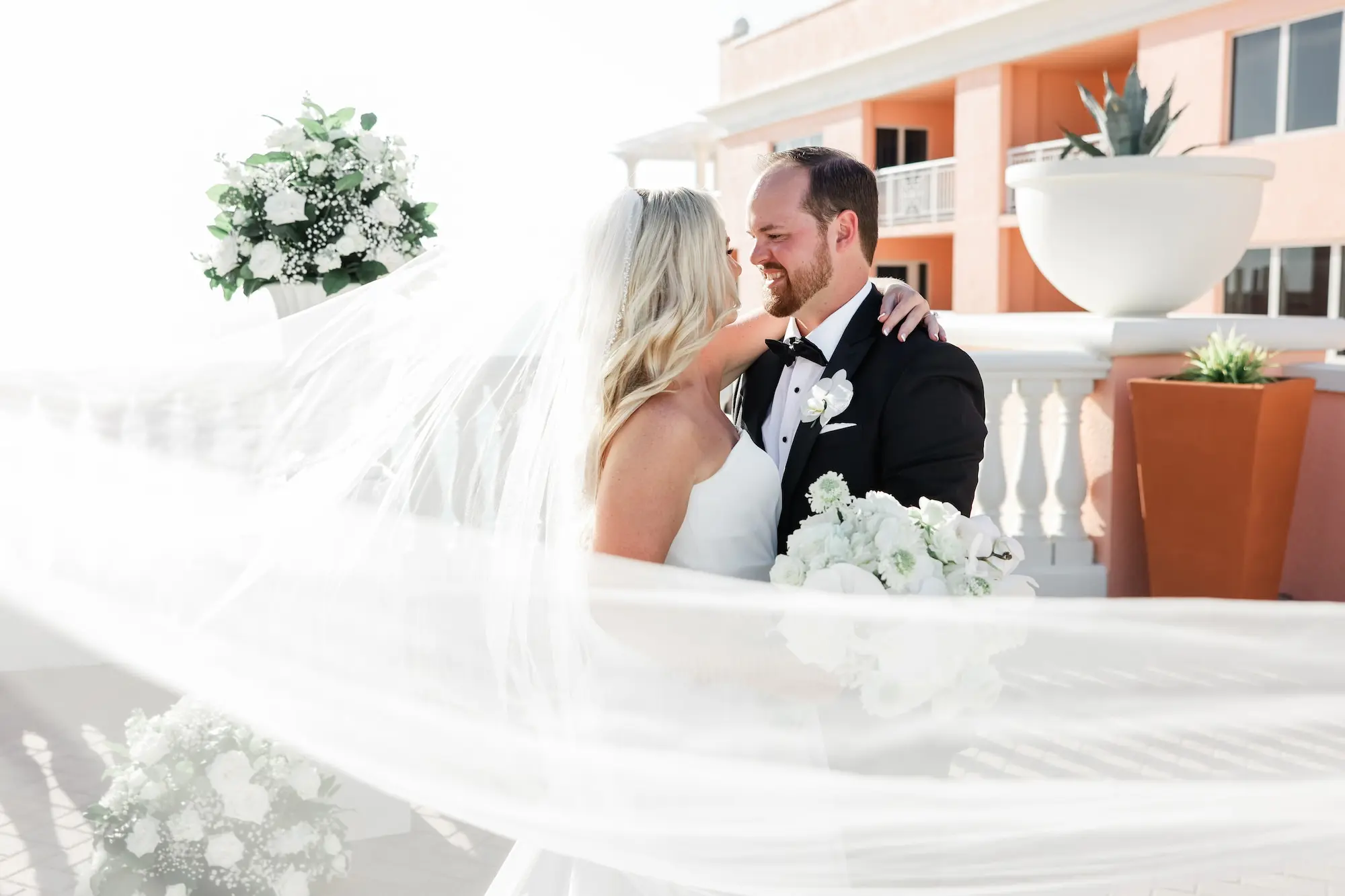 36Classic White Florida Wedding Ideas Venue Hyatt Clearwater Beach - Classic, White Rooftop Wedding | Hyatt Regency Clearwater Beach Bride and Groom in Veil Wedding Portrait | Tampa Bay Photographer Lifelong Photography Studio