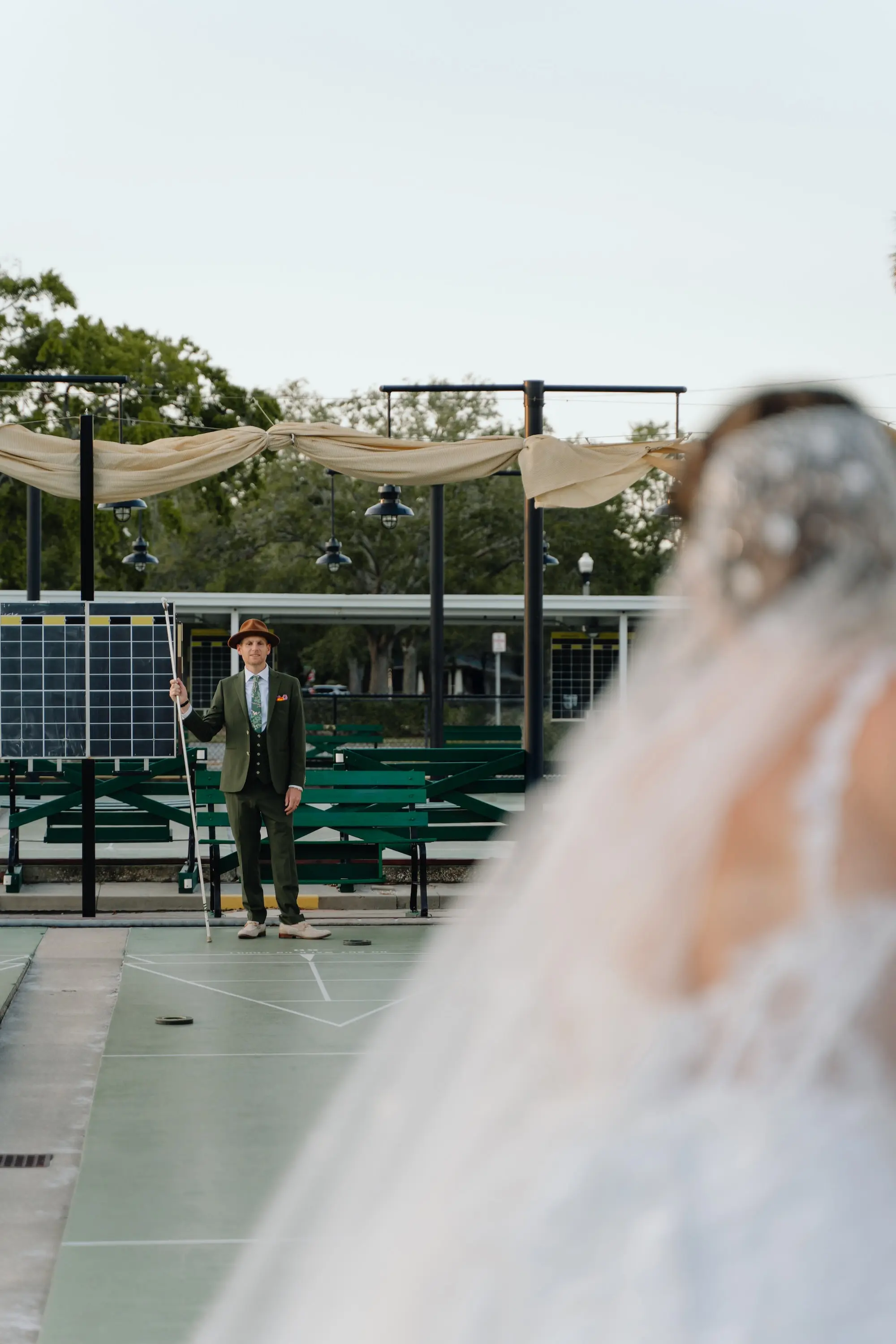 36Colorful Pink Yellow Orange Florida Wedding Inspiration St Petersburg Venue Shuffleboard Club - “Best Of” 2025: Wedding Portraits Groom Shuffleboard Wedding Portrait | Tampa Bay Event Venue St Petersburg Shuffleboard Club