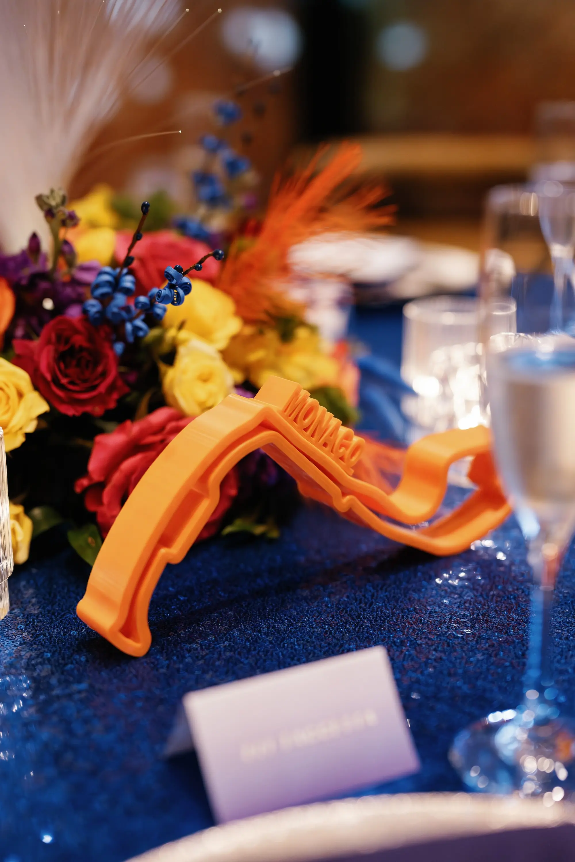 38Whimsical Rainbow Inspired Wedding Ideas - “Best Of” 2025: Wedding Receptions Part 2 Bright Colorful Rainbow Wedding Reception Decor Inspiration | Blue Sequined Table Cloth Ideas | Over The Top Rental Linens | FI Racing Track Wedding Reception Table Numbers Ideas | Event Planner Unique Weddings and Events | Tabletop Rentals A Chair Affair