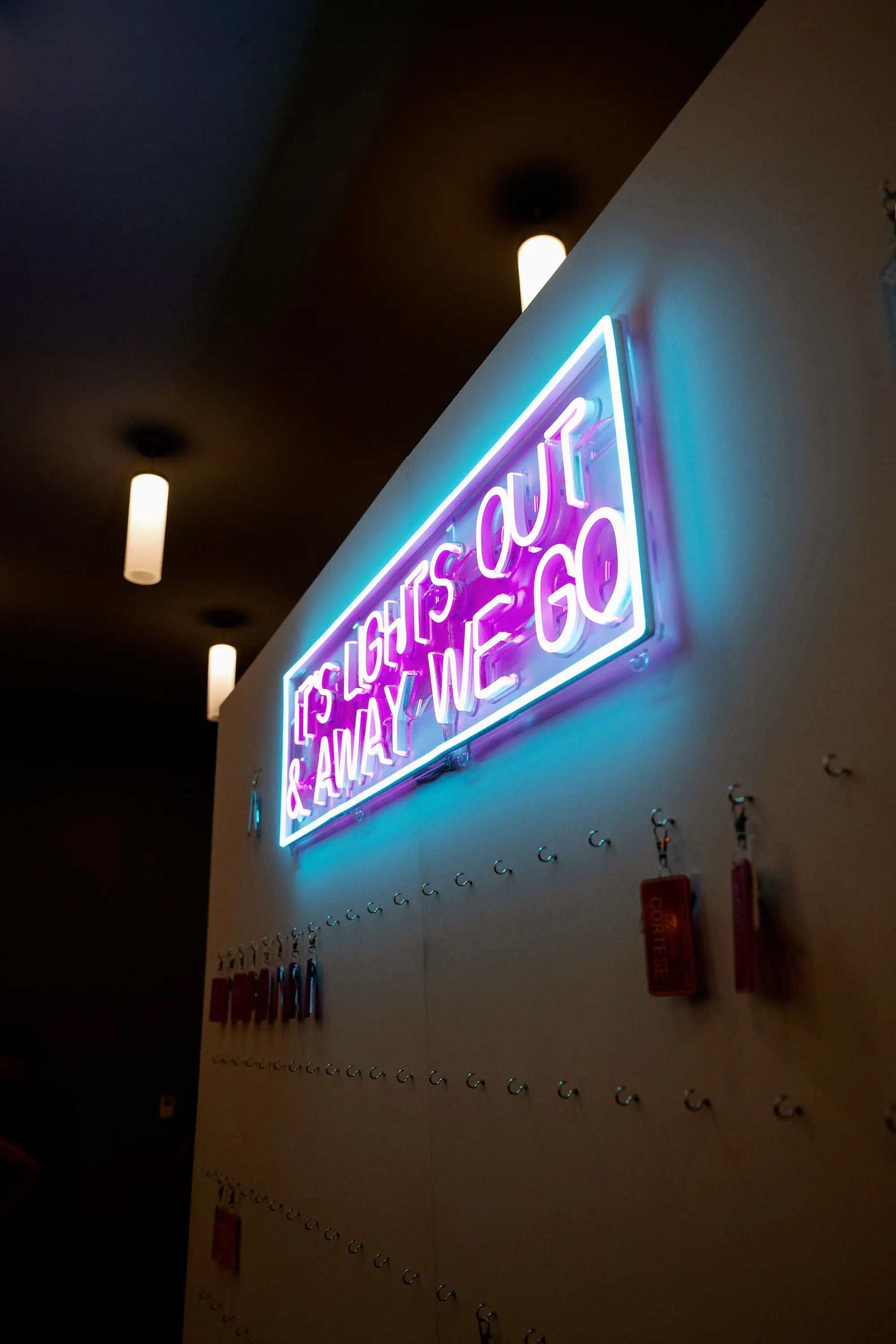 41Whimsical Rainbow Inspired Wedding Ideas - “Best Of” 2025: Wedding Receptions Part 2 Neon F1 Racing Sign Wedding Reception Colorful Decor Inspiration | Tampa Bay Event Planner Unique Weddings and Events