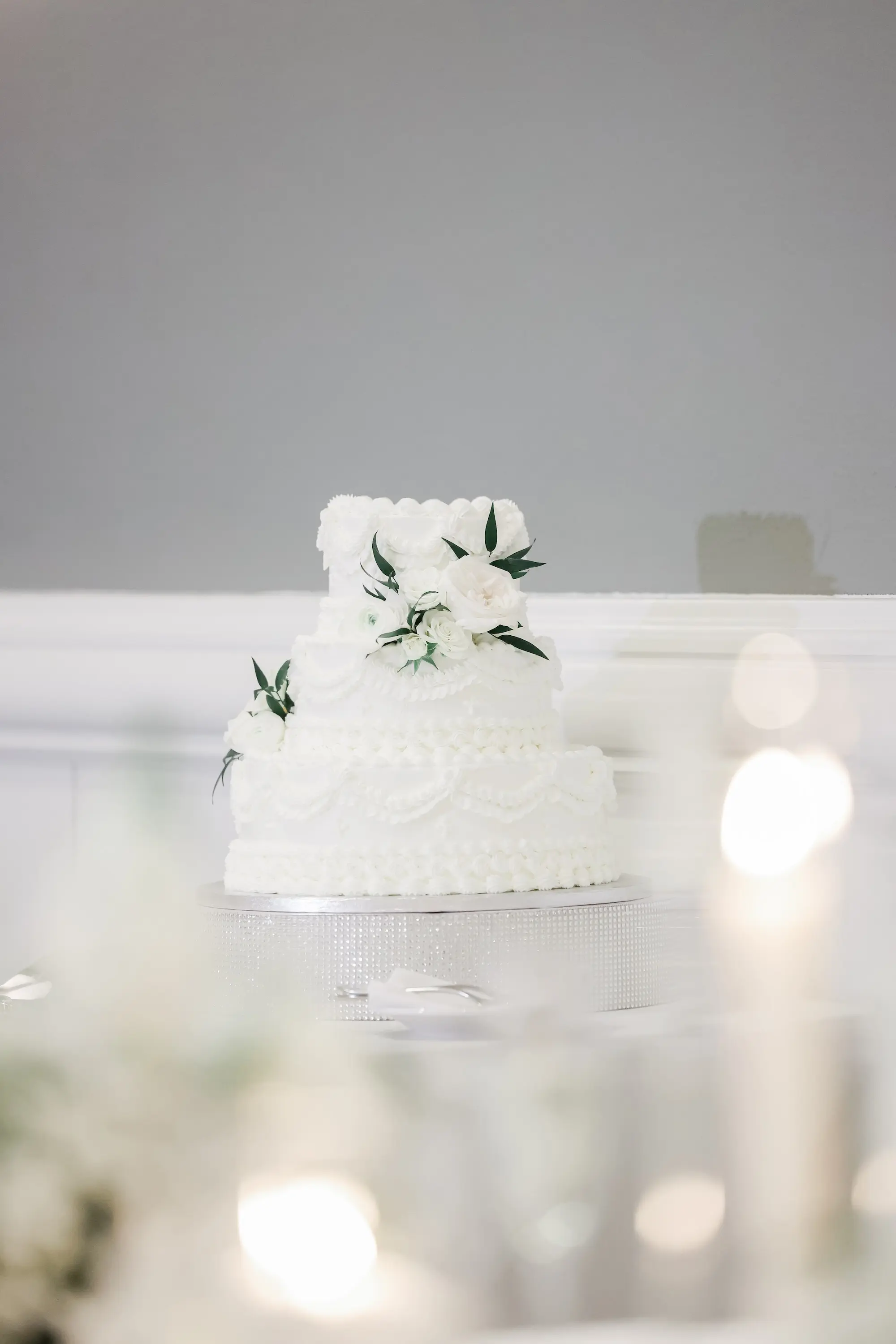 49Classic White Florida Wedding Ideas - Classic, White Rooftop Wedding | Hyatt Regency Clearwater Beach Classic Three Tier White Wedding Cake with White Details and Florals Inspiration