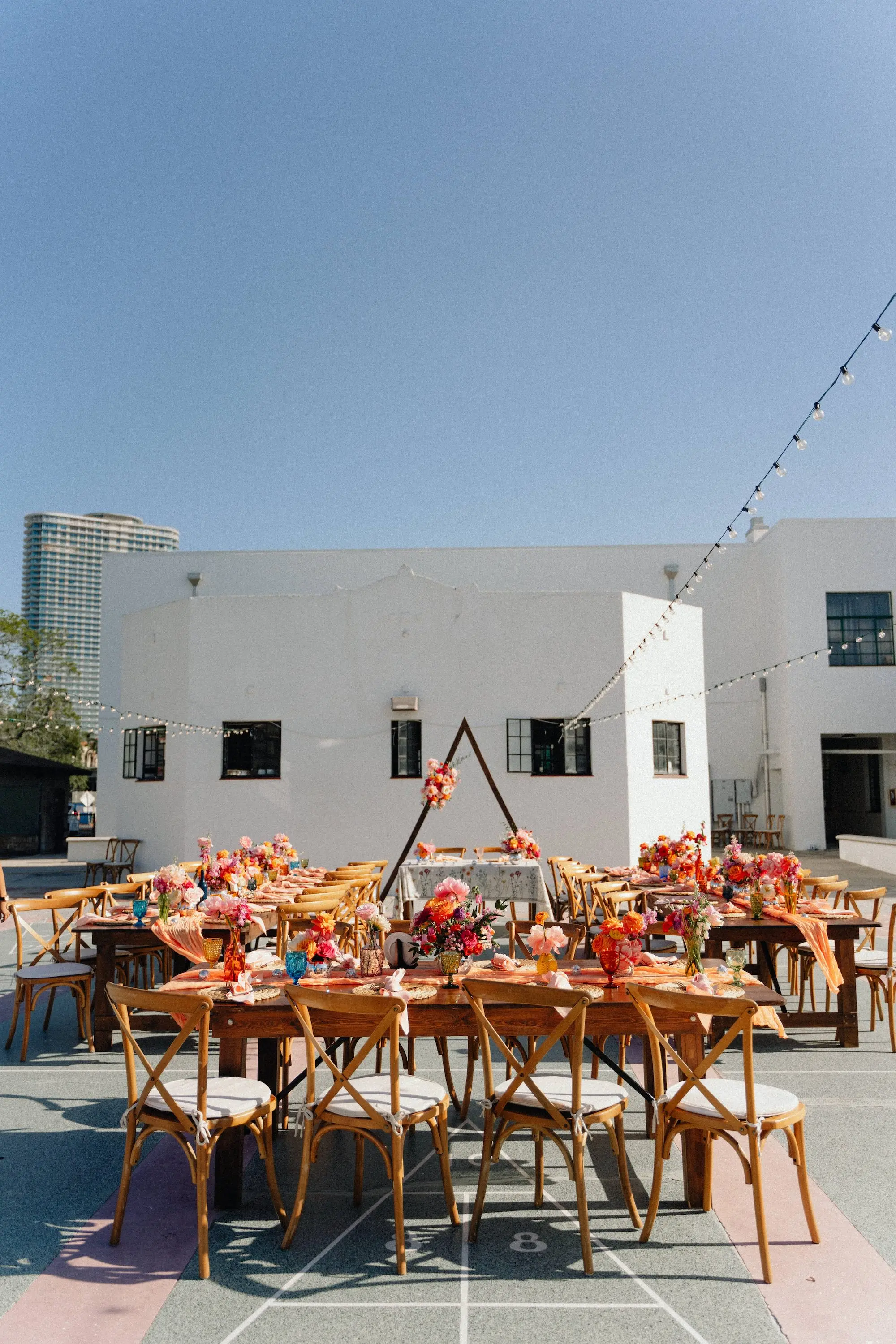 49Colorful Pink Yellow Orange Florida Wedding Inspiration St Petersburg Venue Shuffleboard Club - “Best Of” 2025: Wedding Receptions Part 2 Colorful Pink, Yellow, and Orange Spring Florida Wedding Reception Decor Ideas | Tampa Bay Event Venue St Petersburg Shuffleboard Club | Planner Wilder Mind Events
