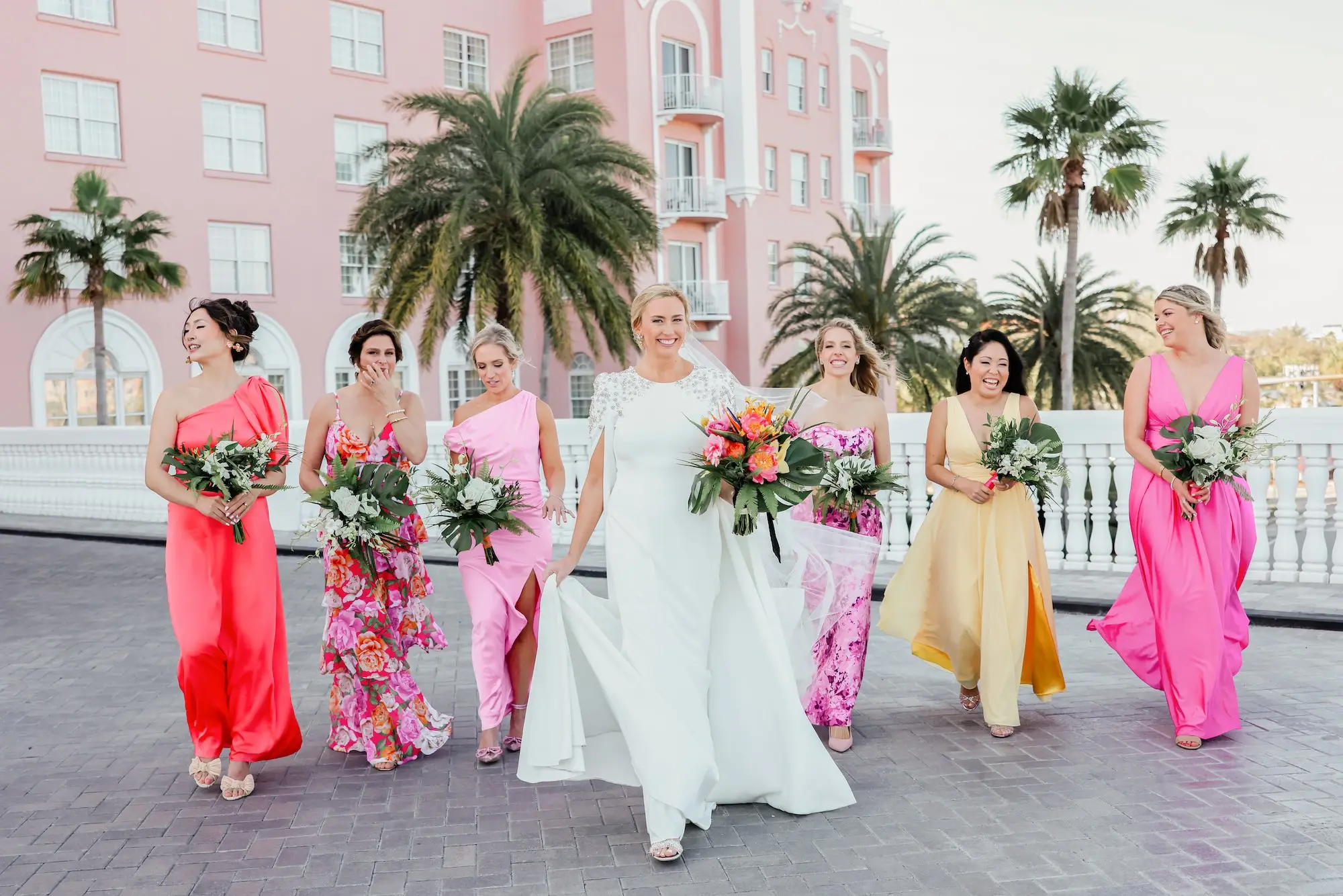 9Luxurious Vibrant Tropical Florida Wedding - Vibrant, Tropical St. Pete Beach Wedding | The Don CeSar Tropical Mismatched Bridesmaids Wedding Dress Ideas