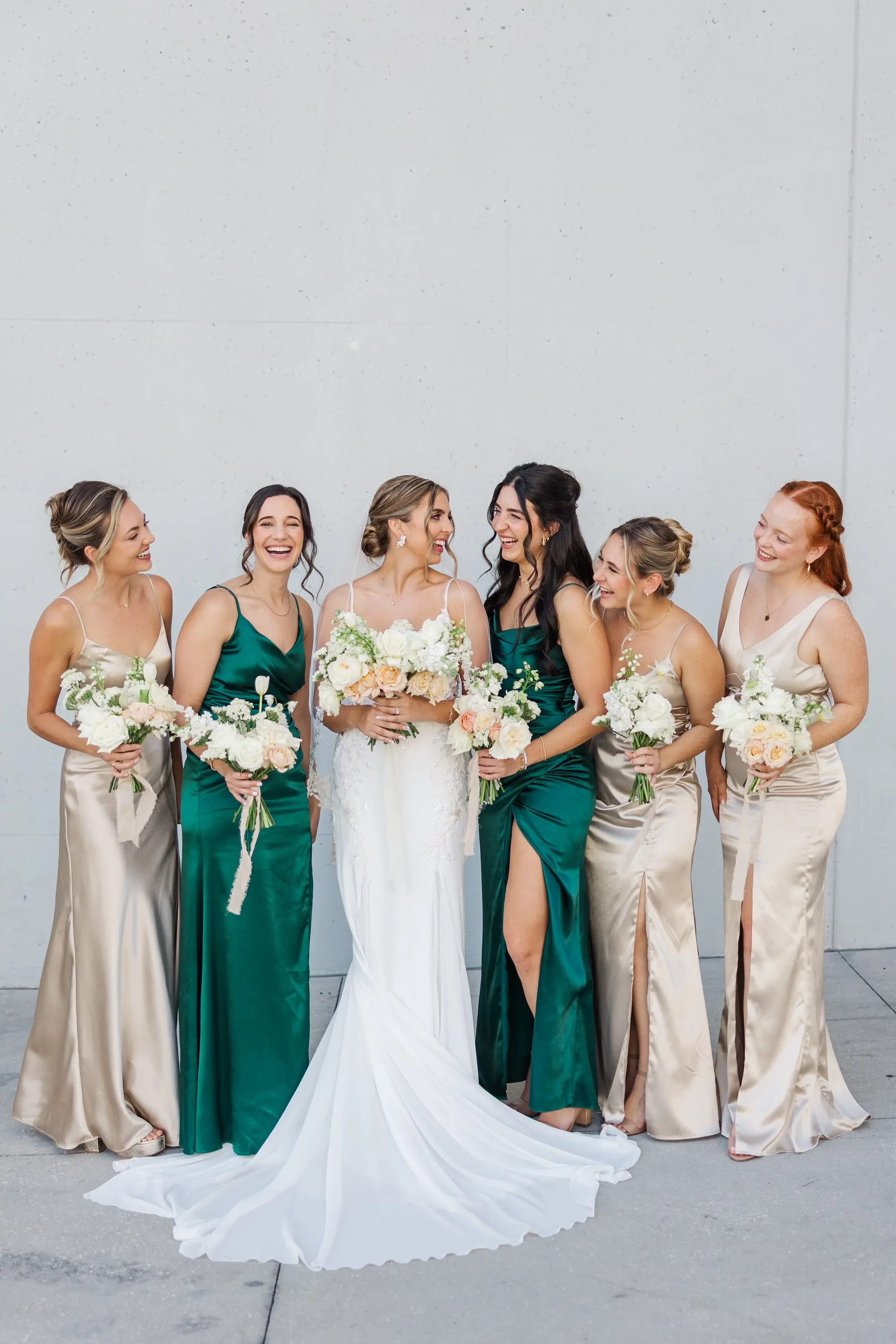 13Classic Emerald Green and Champagne Wedding Inspiration - Classic Emerald Green Downtown Tampa Wedding | Bob Buckhorn Center Bride with Bridesmaids Wedding Portrait | Mismatched Satin Emerald Green and Champagne Bridesmaid Dresses Inspiration | White and Light Pink Floral Bouquet Ideas