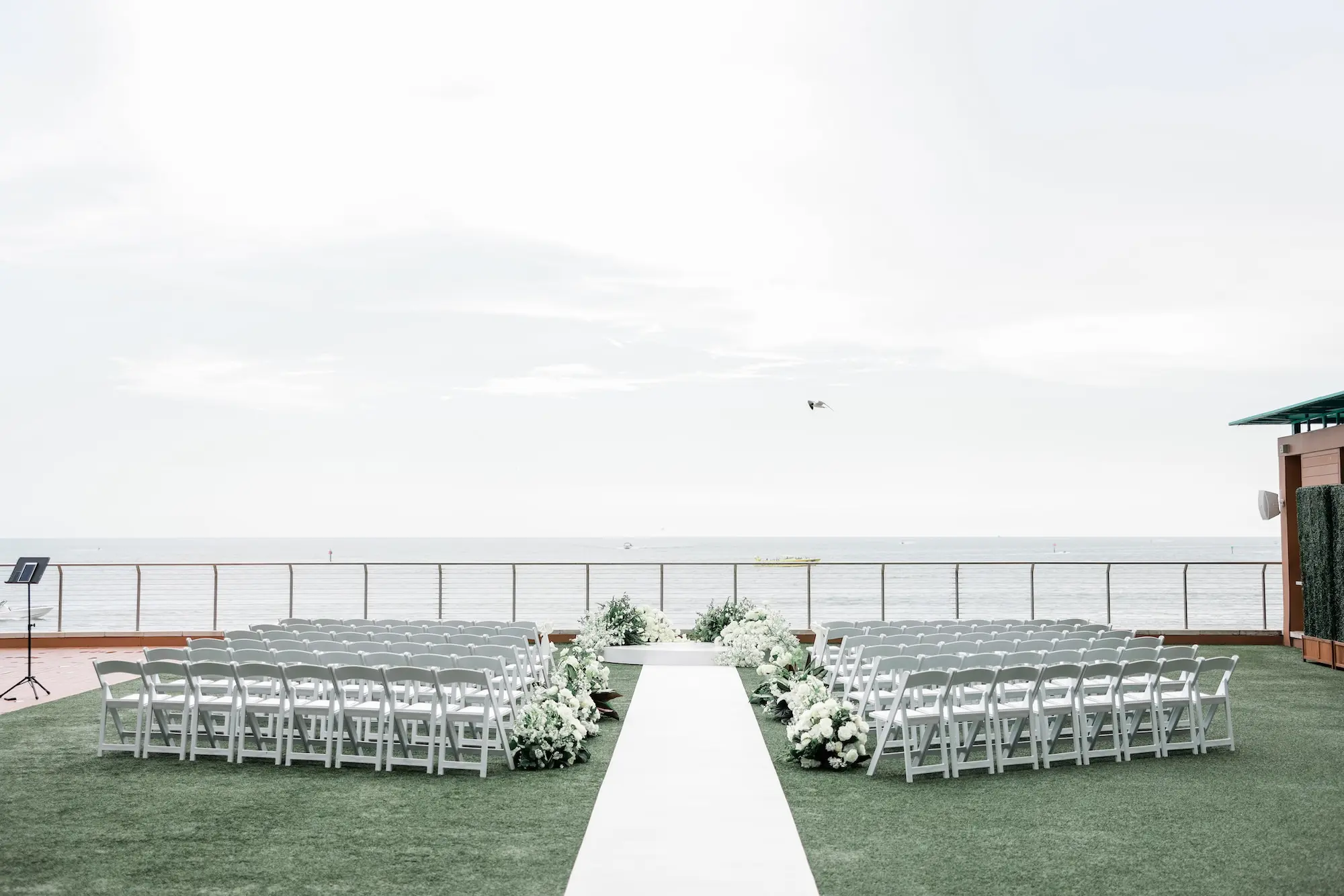 Chic Black and White Florida Beach Wedding Ceremony Decor Inspiration | Clearwater Event Venue Opal Sands | Kate Ryan Event Rentals