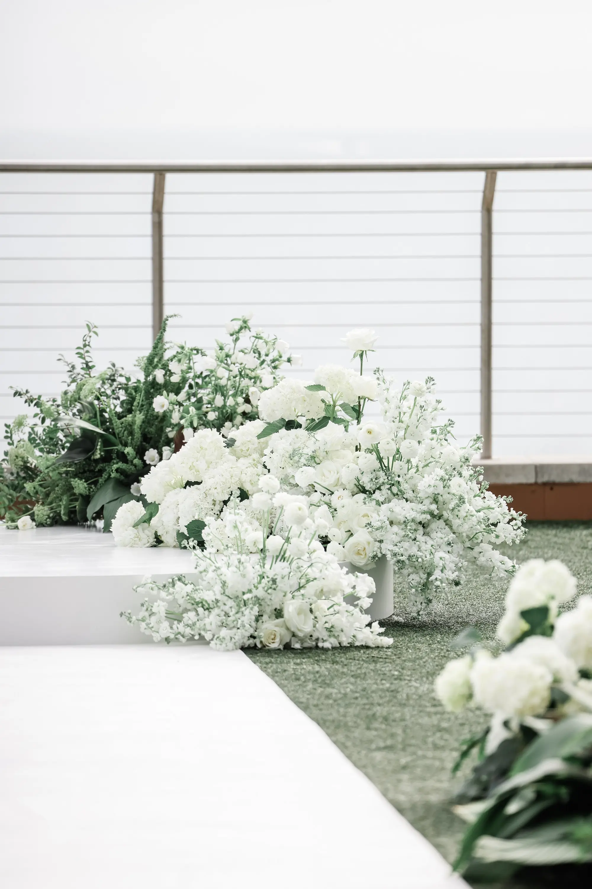 Chic Black and White Wedding Ceremony Altar Decor Inspiration | White Flowers with Greenery | Clearwater Kate Ryan Event Rentals