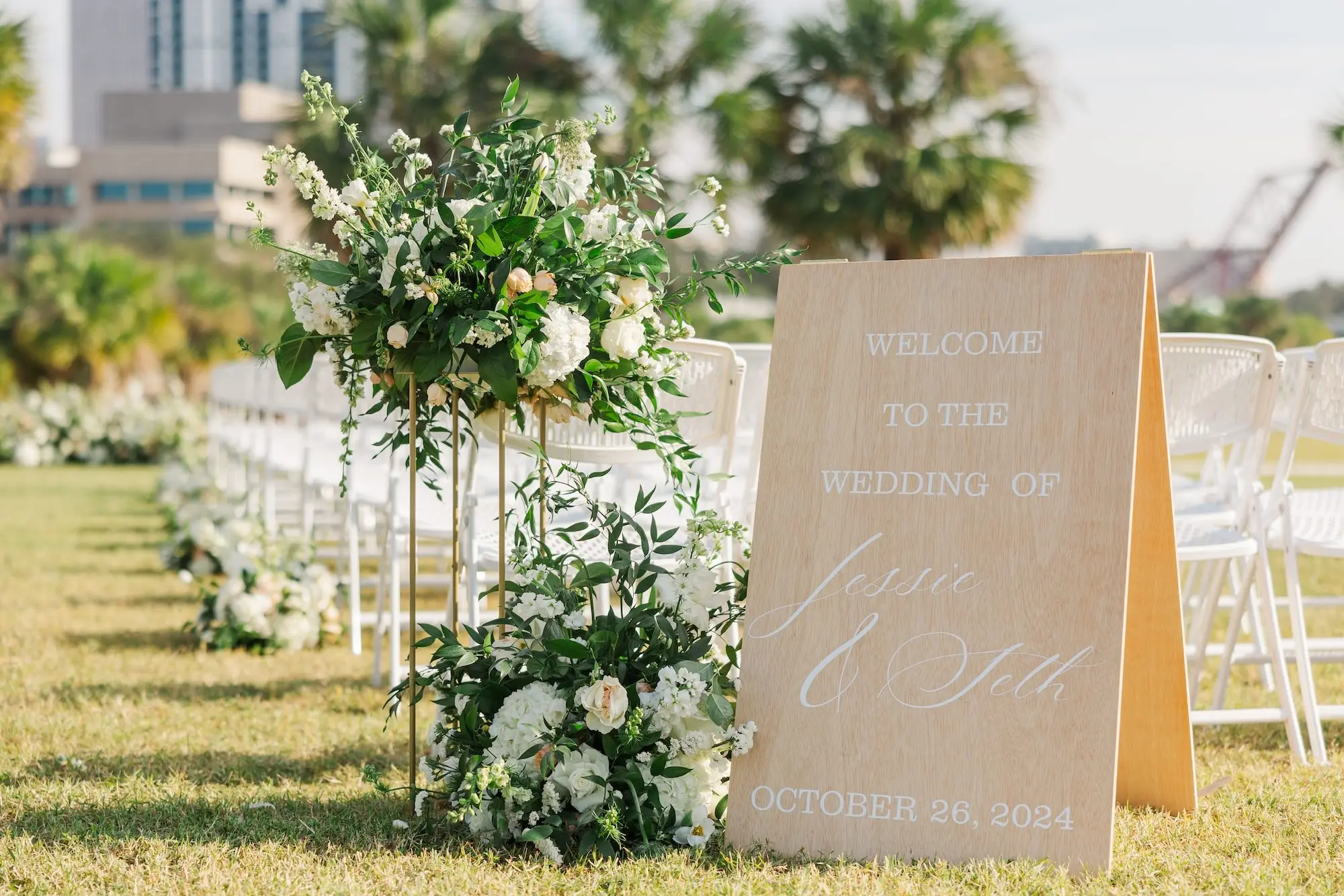 19Classic Emerald Green and Champagne Wedding Inspiration - Classic Emerald Green Downtown Tampa Wedding | Bob Buckhorn Center Outdoor Riverfront Wedding Ceremony Inspiration | White Floral with Greenery Flower Arrangement Aisle Decor Inspiration | Linen Ceremony Sign Ideas | Tampa Bay Planner Wilder Mind Events | Florida Sign Designer madWOLFE | Venue Tampa River Center