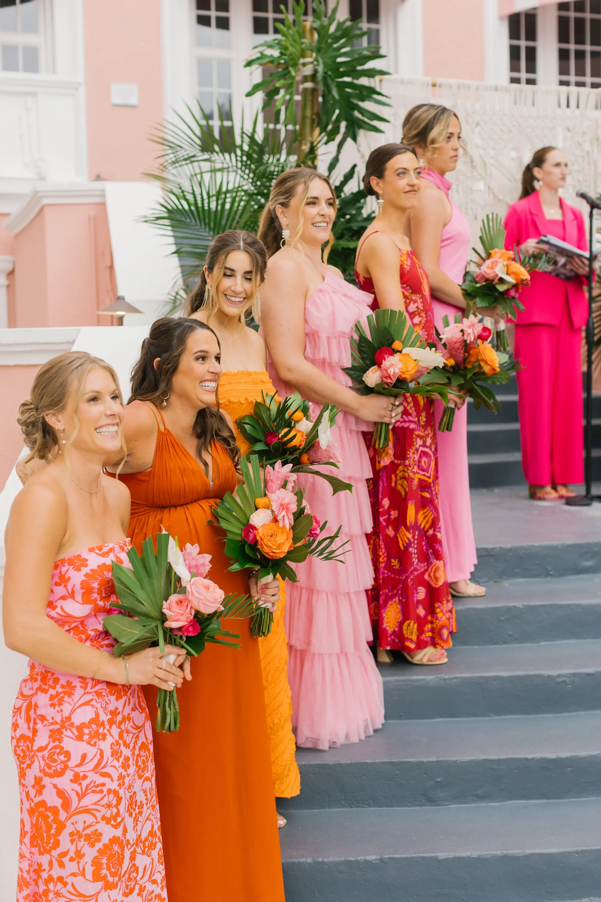 20Tropical Beach Boho Pink and Orange Wedding Inspiration - Vibrant, Tropical Boho St. Pete Beach Wedding | The Don CeSar Wedding Ceremony at Historic Pink Palace St Pete Beach Wedding Venue Don CeSar | Mismatched Pink, Orange and Red Bridesmaid Dresses Inspiration | Tropical Palm Fronds with Peach, Pink, White, and Orange Floral Bouquets Ideas | Natural Bridal Makeup Inspiration | Tampa Bay Hair and Makeup Artist Femme Akoi Beauty Studio