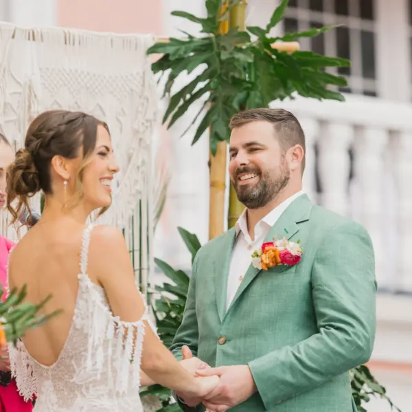 24Tropical Beach Boho Pink and Orange Wedding Inspiration - Vibrant, Tropical Boho St. Pete Beach Wedding | The Don CeSar Bride and Groom Wedding Ceremony Vow Exchange Wedding Portrait | Macrame Wedding Ceremony Altar Decor Inspiration | Tampa Bay Planner EventFull Weddings | Historic Pink Palace St Pete Beach Wedding Venue Don CeSar | St Pete Beach Resort Wedding Venue