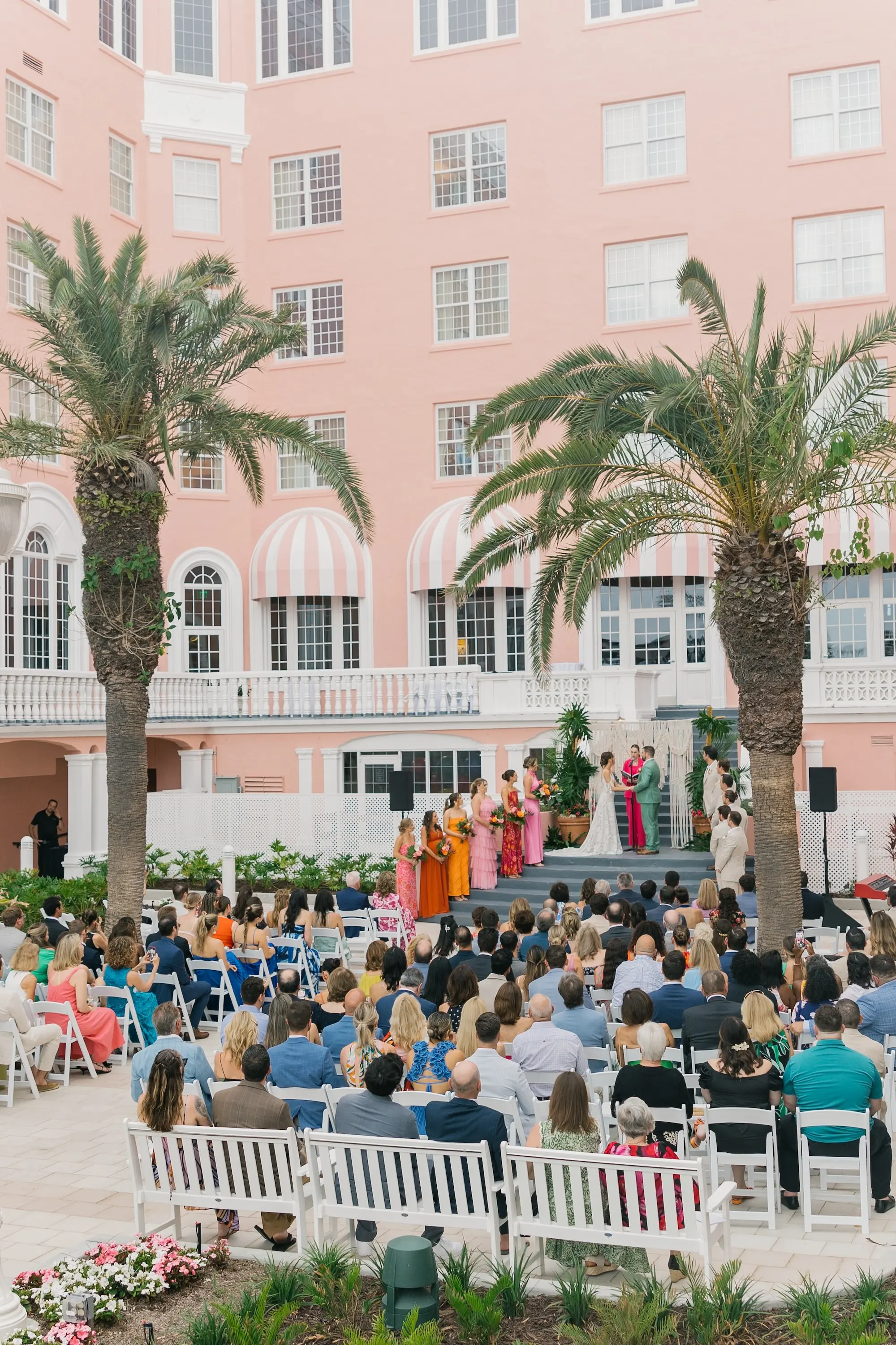25Tropical Beach Boho Pink and Orange Wedding Inspiration St Pete Venue The Don CeSar - Vibrant, Tropical Boho St. Pete Beach Wedding | The Don CeSar Bride and Groom Wedding Ceremony Vow Exchange Wedding Portrait | Tampa Bay Planner EventFull Weddings | Historic Pink Palace St Pete Beach Wedding Venue Don CeSar | St Pete Beach Resort Wedding Venue
