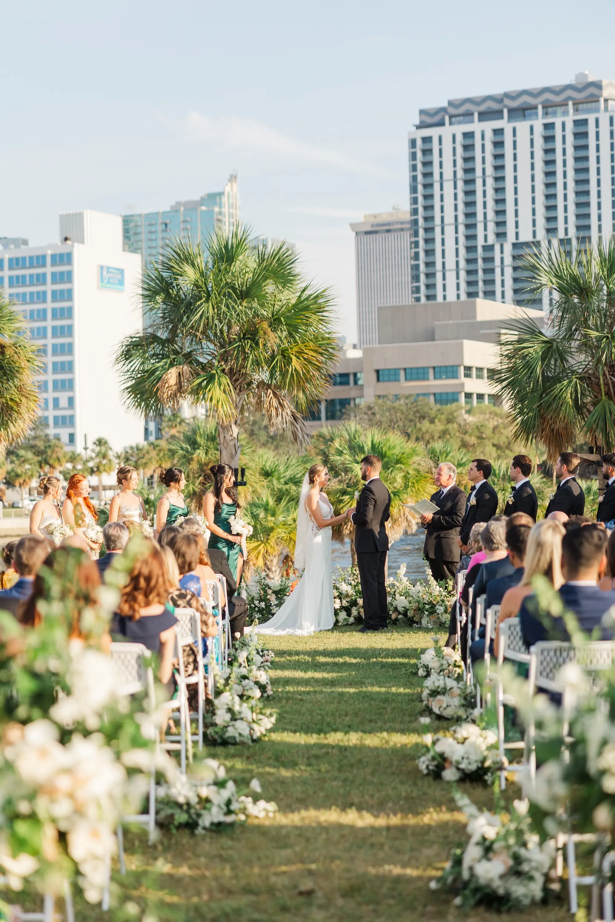 26Classic Emerald Green and Champagne Wedding Inspiration Bob Buckhorn Tampa River Center Venue - Classic Emerald Green Downtown Tampa Wedding | Bob Buckhorn Center Bride and Groom Outdoor Riverfront Wedding Ceremony Vow Exchange Wedding Portrait | Tampa Bay Photographer Mary Anna Photography | Venue Tampa River Center