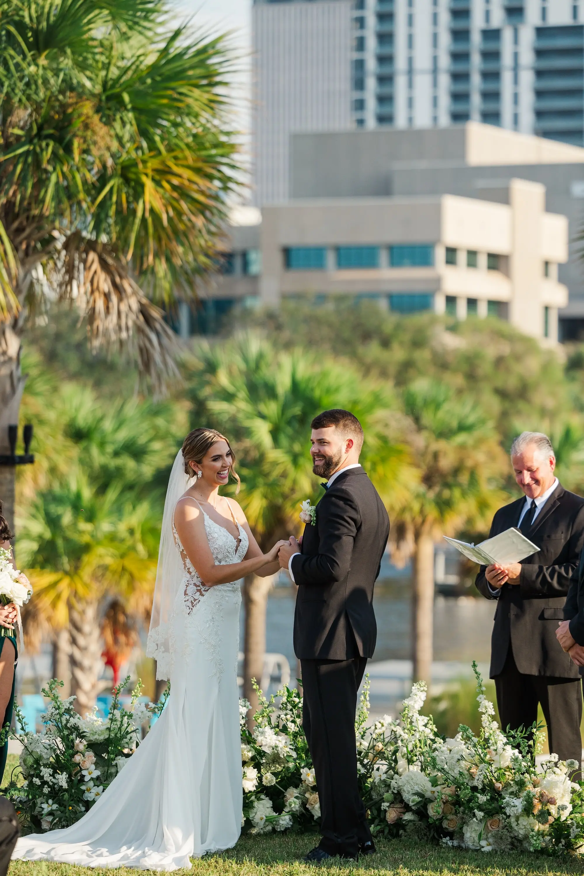 27Classic Emerald Green and Champagne Wedding Inspiration - Classic Emerald Green Downtown Tampa Wedding | Bob Buckhorn Center Bride and Groom Wedding Ceremony Vow Exchange Wedding Portrait | Outdoor Riverfront Wedding Ceremony Inspiration | Venue Tampa River Center