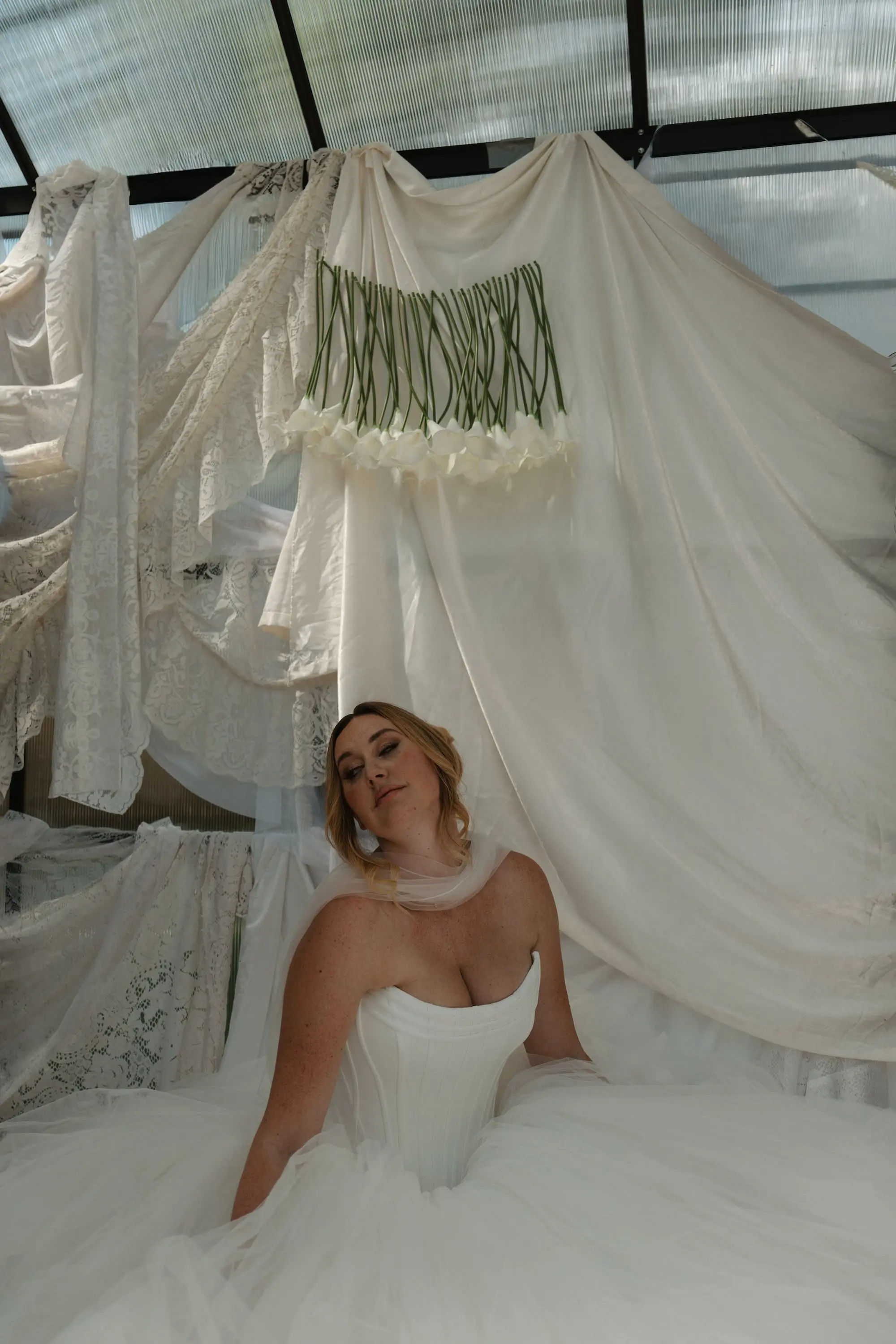 Ethereal Hanging Cala Lily Flowers Modern Elegant Greenhouse Wedding Inspiration | Tulle Ballgown Dress with Corset and Scarf | Tampa Photographer Amber Yonker Photography Dresses Truly Forever Bridal