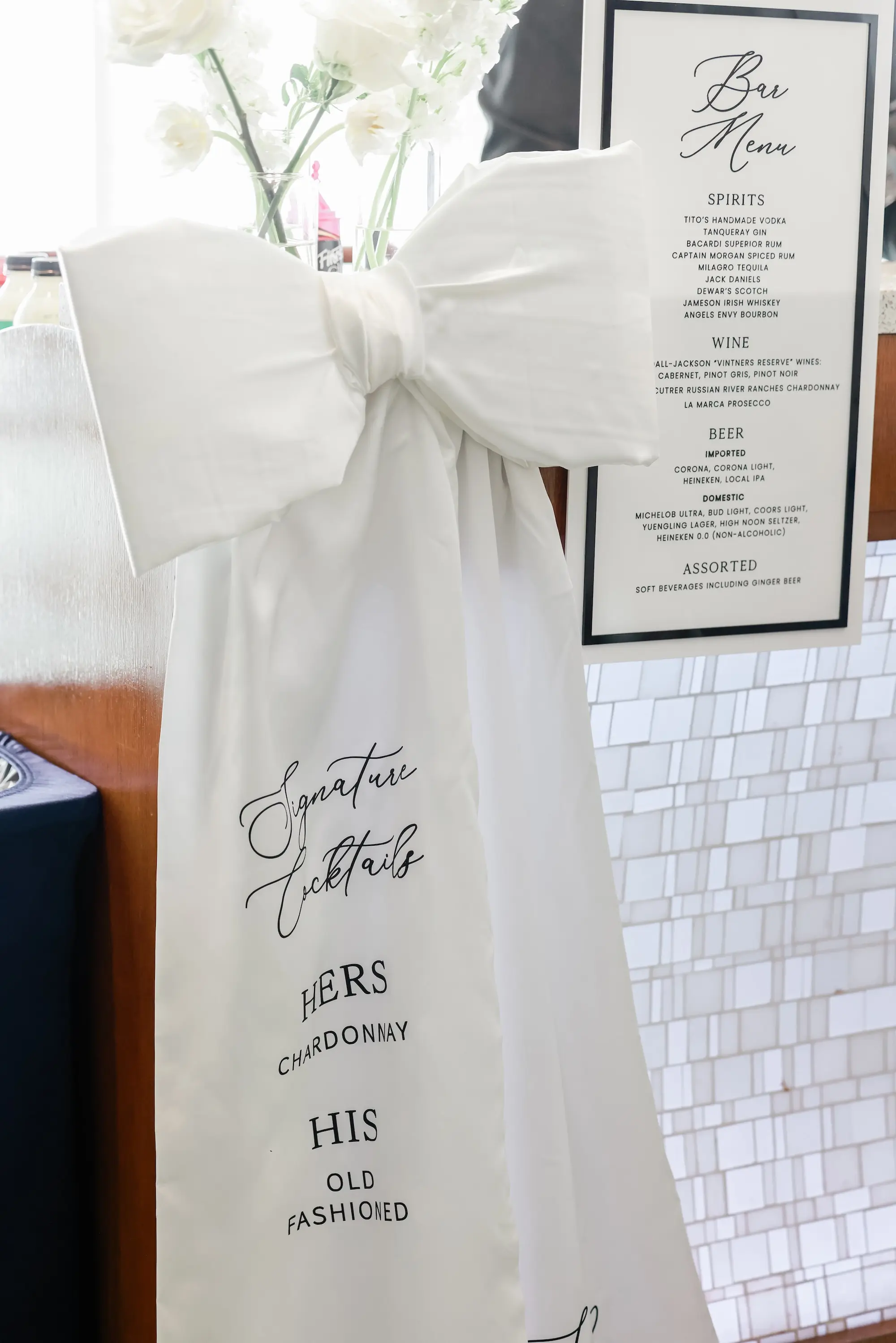 Chic Black and White Wedding Reception Bar Bow Signature Drink Display Inspiration