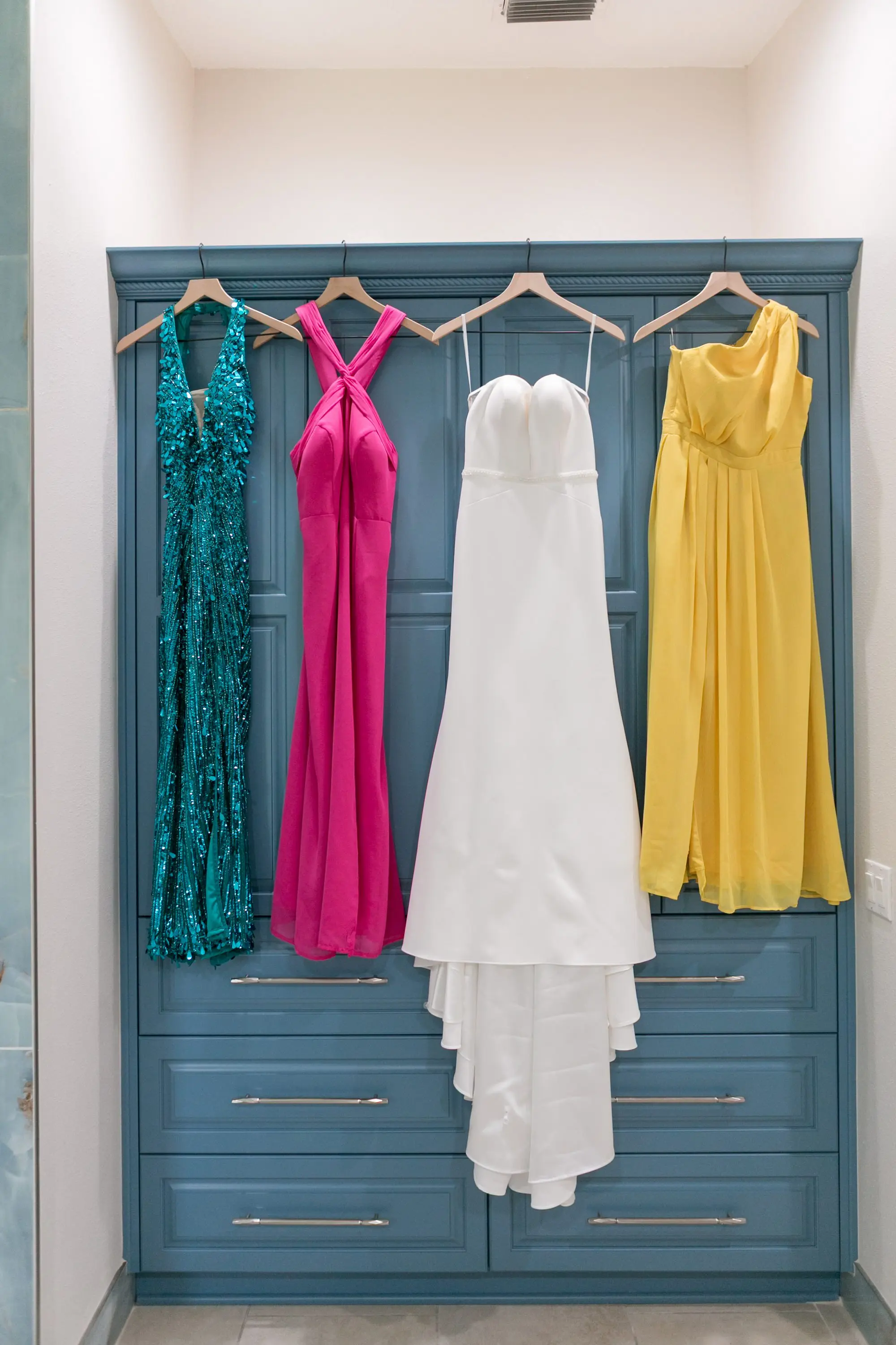3Colorful Modern Yellow and Pink Wedding Ideas - Vibrant, Modern Gallery Wedding | Tampa Museum of Art Blue, Pink, and Yellow Bridesmaids Dress Inspiration | White Fit and Flare Wedding Dress Ideas