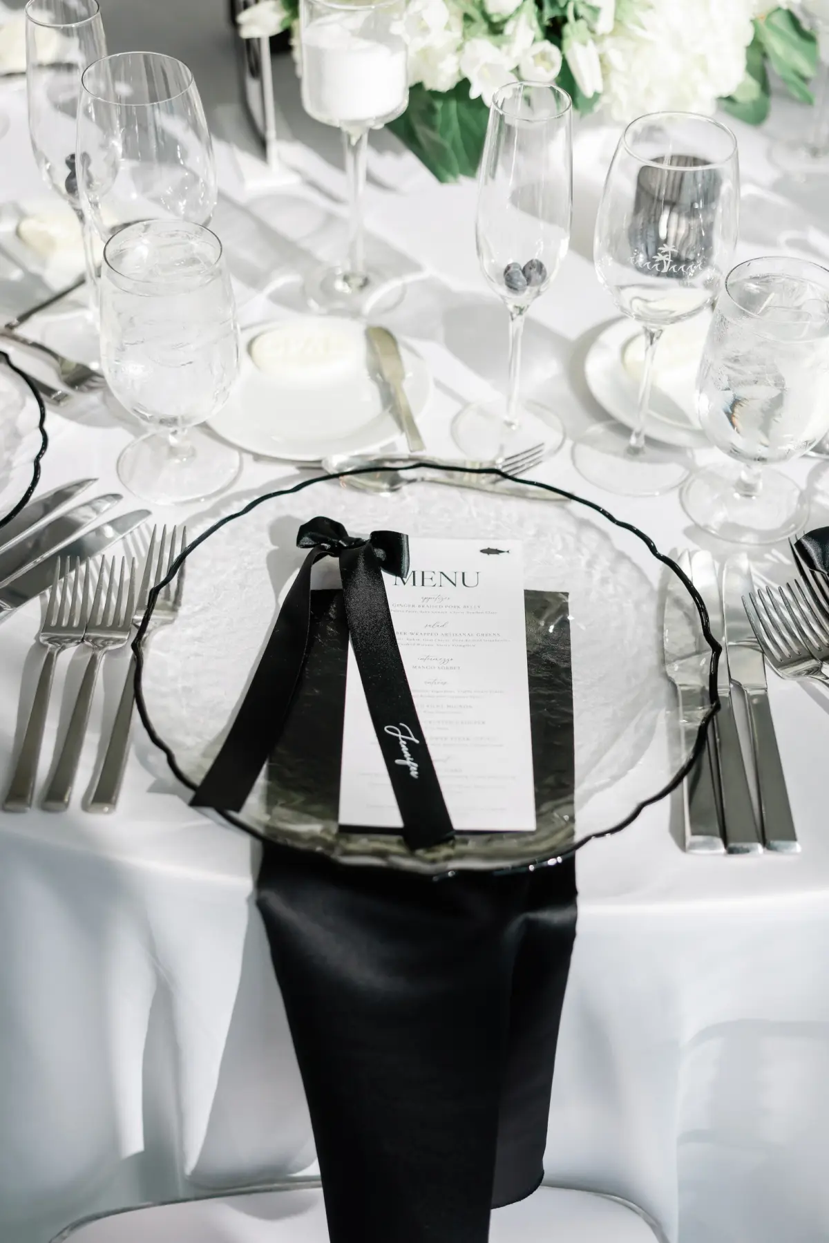 Chic Black and White Wedding Reception Place Setting Inspiration