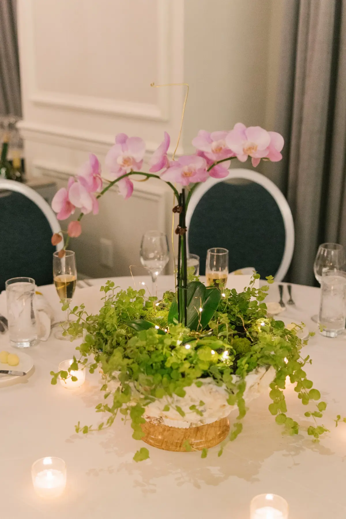 40Tropical Beach Boho Pink and Orange Wedding Inspiration - Vibrant, Tropical Boho St. Pete Beach Wedding | The Don CeSar Boho Beach Wedding Reception Decor Inspiration | Long Table with White Linens and Tropical Purple Orchid Florals and Ferns with Gold Palms Centerpieces Decor Ideas | Tampa Bay Planner EventFull Weddings