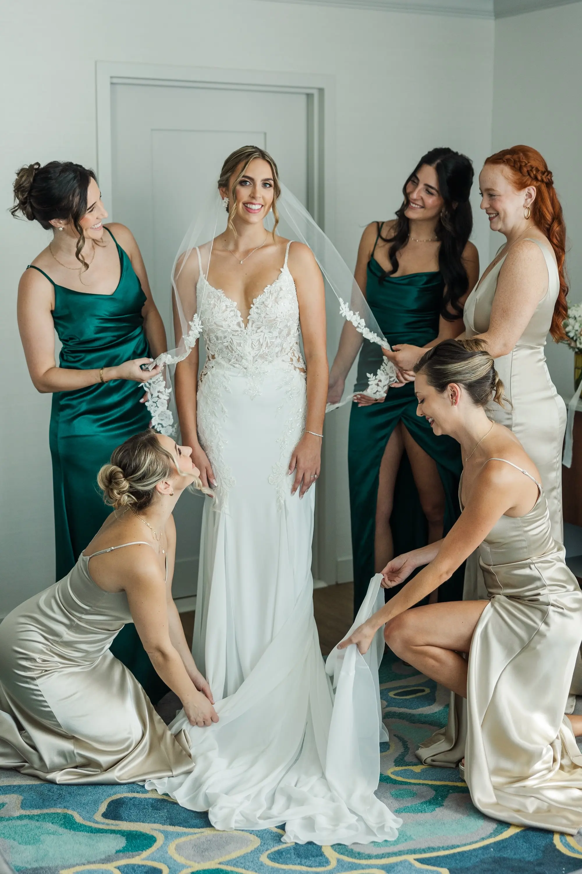 8Classic Emerald Green and Champagne Wedding Inspiration - Classic Emerald Green Downtown Tampa Wedding | Bob Buckhorn Center Bride and Bridesmaids Getting Ready Wedding Portrait | Mismatched Emerald Green and Champagne Satin Bridesmaid Dress Inspiration | Romantic White Enzoani Wedding Gown with Lace Floral Detailed Bodice, Sweetheart Neckline and Delicate Spaghetti Straps Ideas | Tampa Bay Photographer Mary Anna Photography