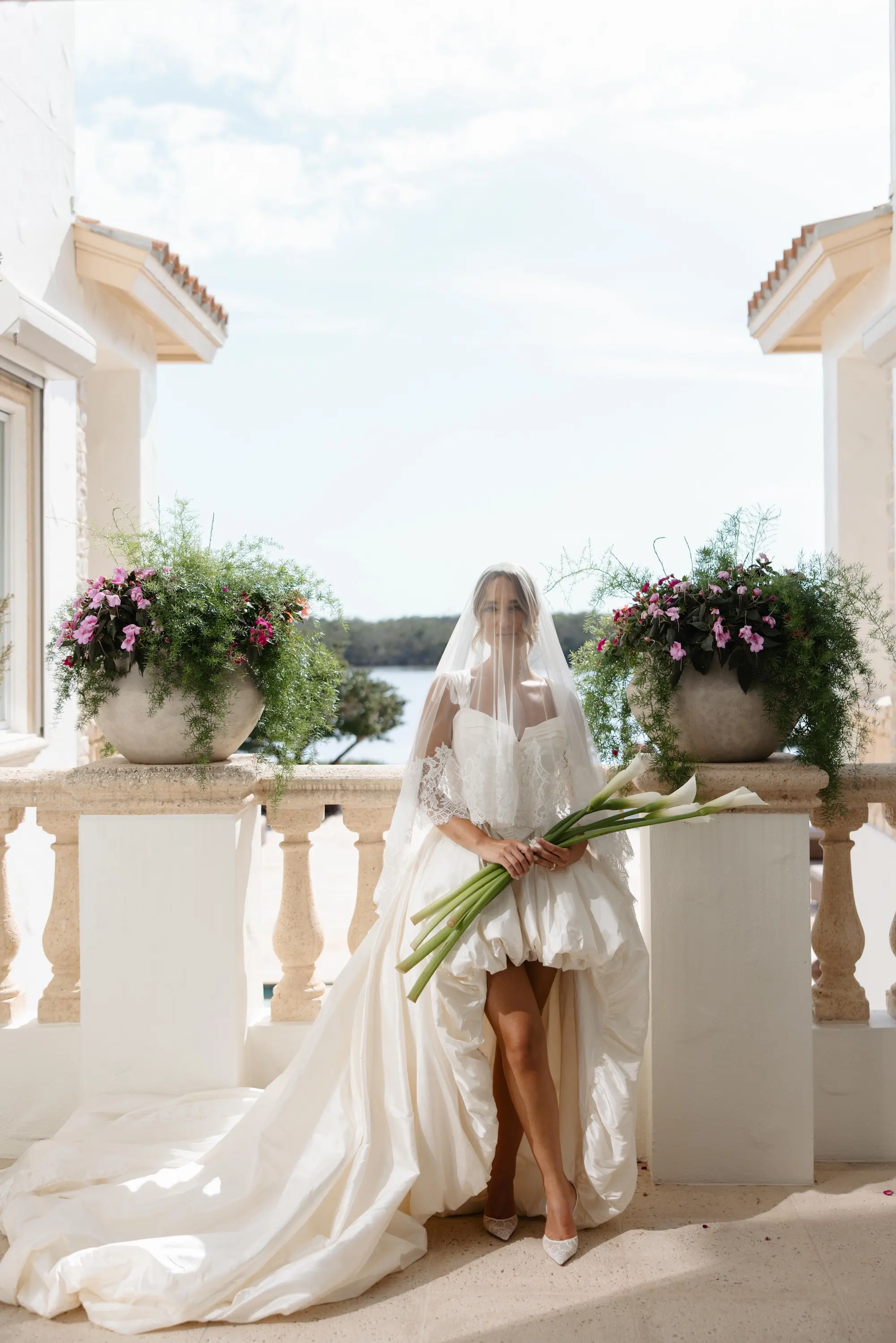 8Elegant Cream Vintage Wedding Inspiration - Luxurious, Neutral Downtown St. Pete Wedding | The Vinoy Elegant Ivory J Andreatta Wedding Dress Inspiration | Unique White Long-Stemmed Calla Lily Bridal Bouquet Ideas