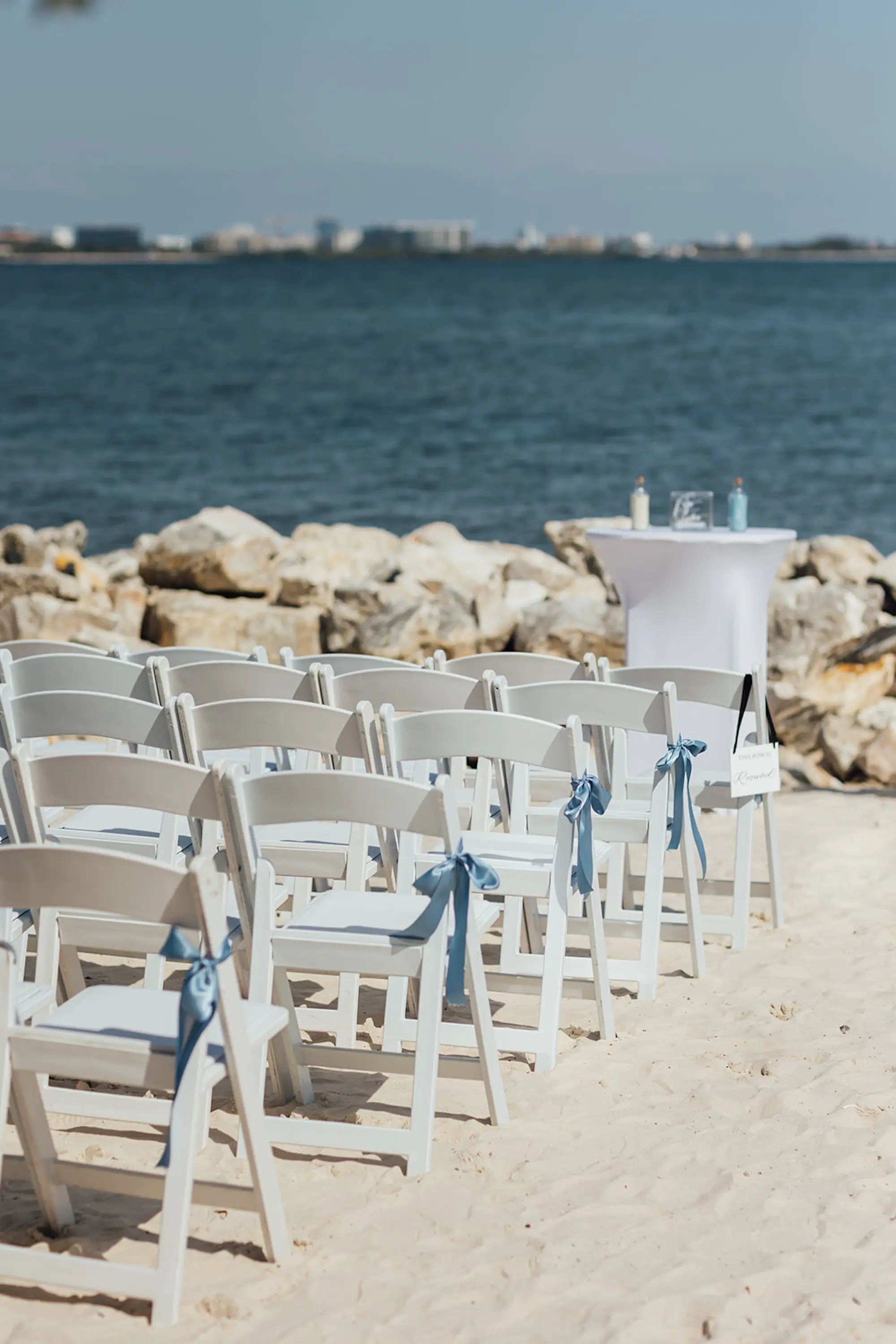 Coastal Peach and Blue Waterfront Wedding Ceremony Decor Inspiration