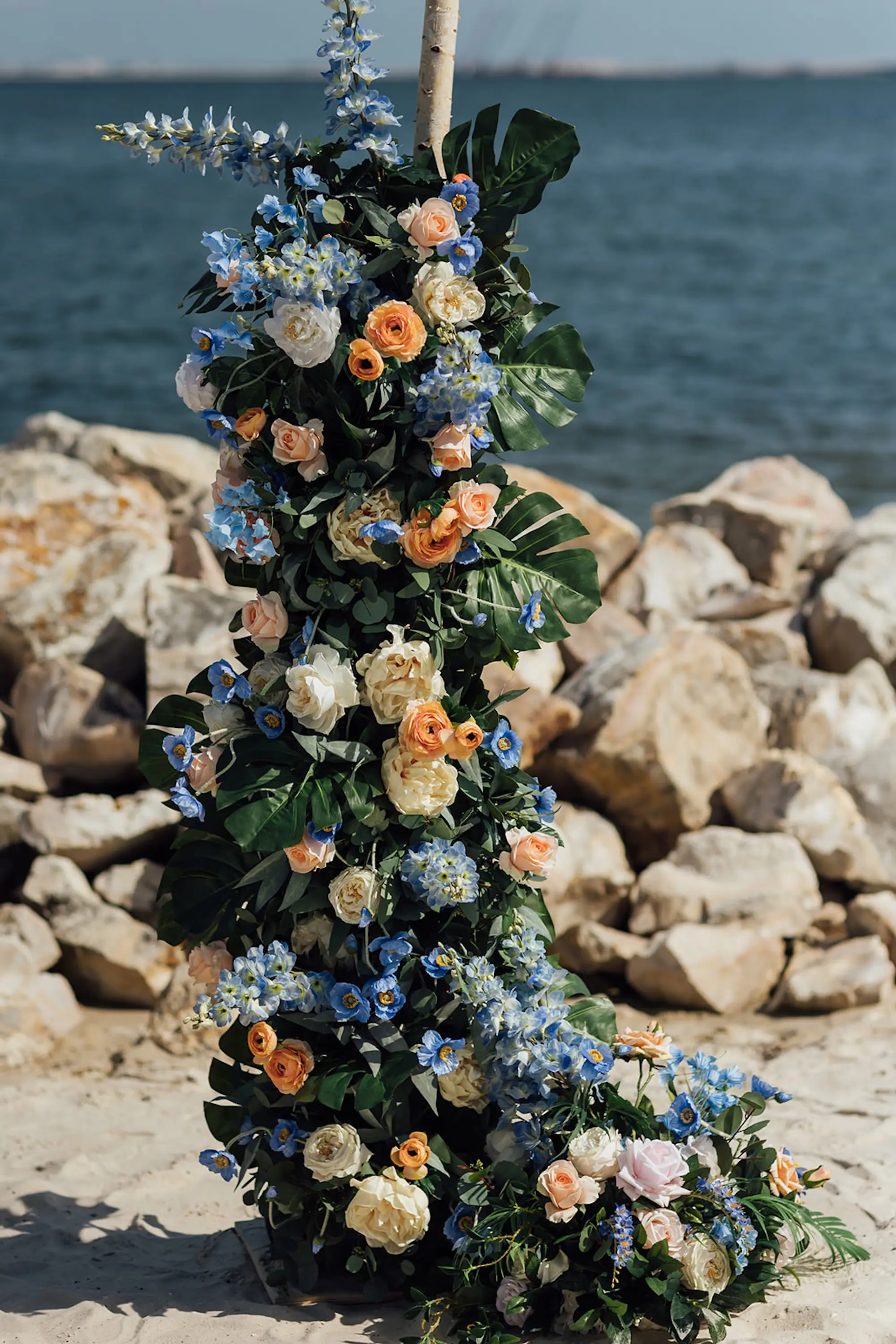 Coastal Peach and Blue Flower Wedding Ceremony Decor Inspiration