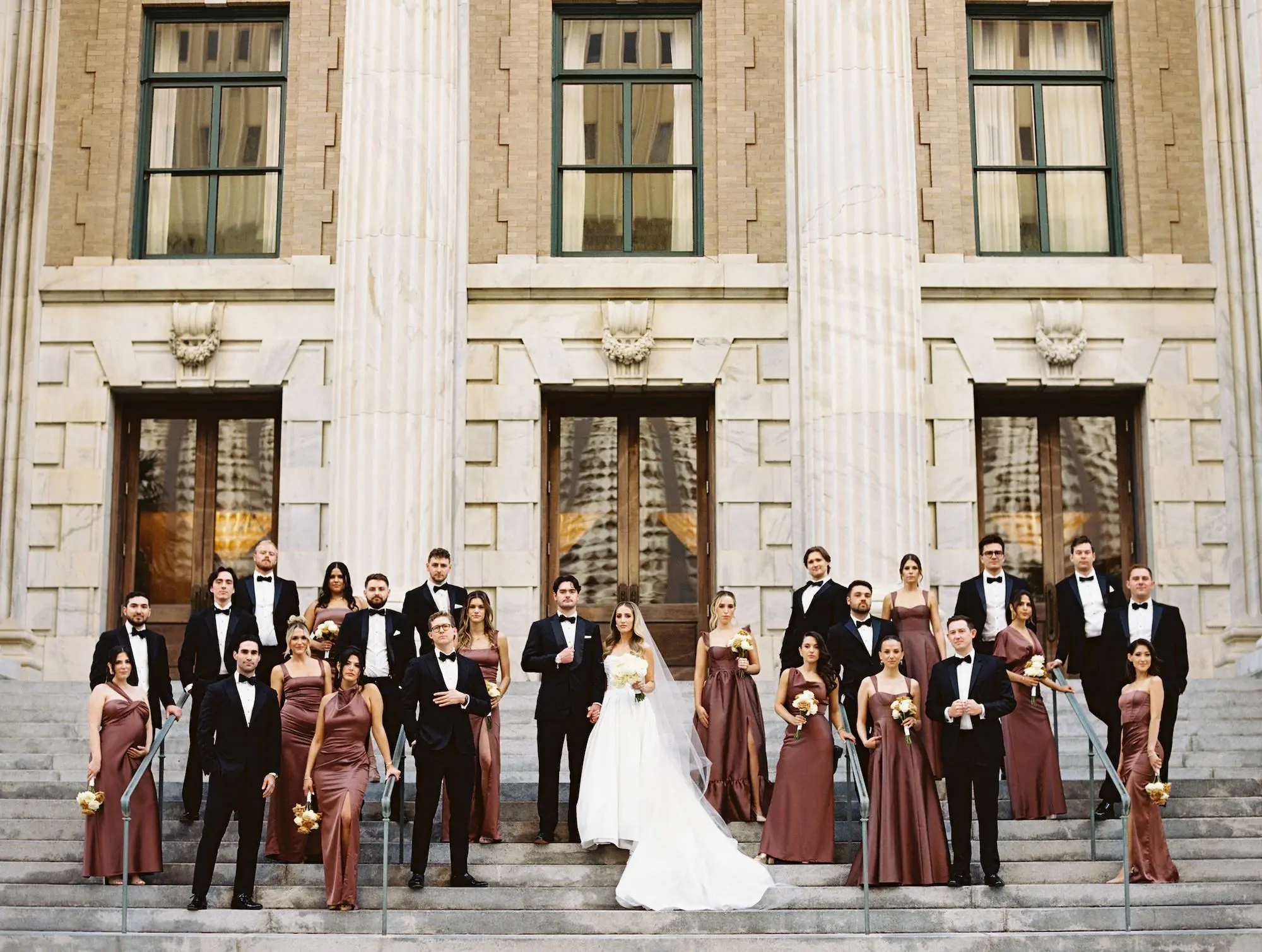 12Modern Black and White Wedding Inspiration Tampa Venue Le Meridien - Timeless Black and White Downtown Tampa Wedding | The Vault Bride and Groom with Bridal Party Wedding Portrait | Mismatched Espresso Brown Satin Bridesmaid Dress Inspiration | Tampa Bay Event Venue Le Meridien