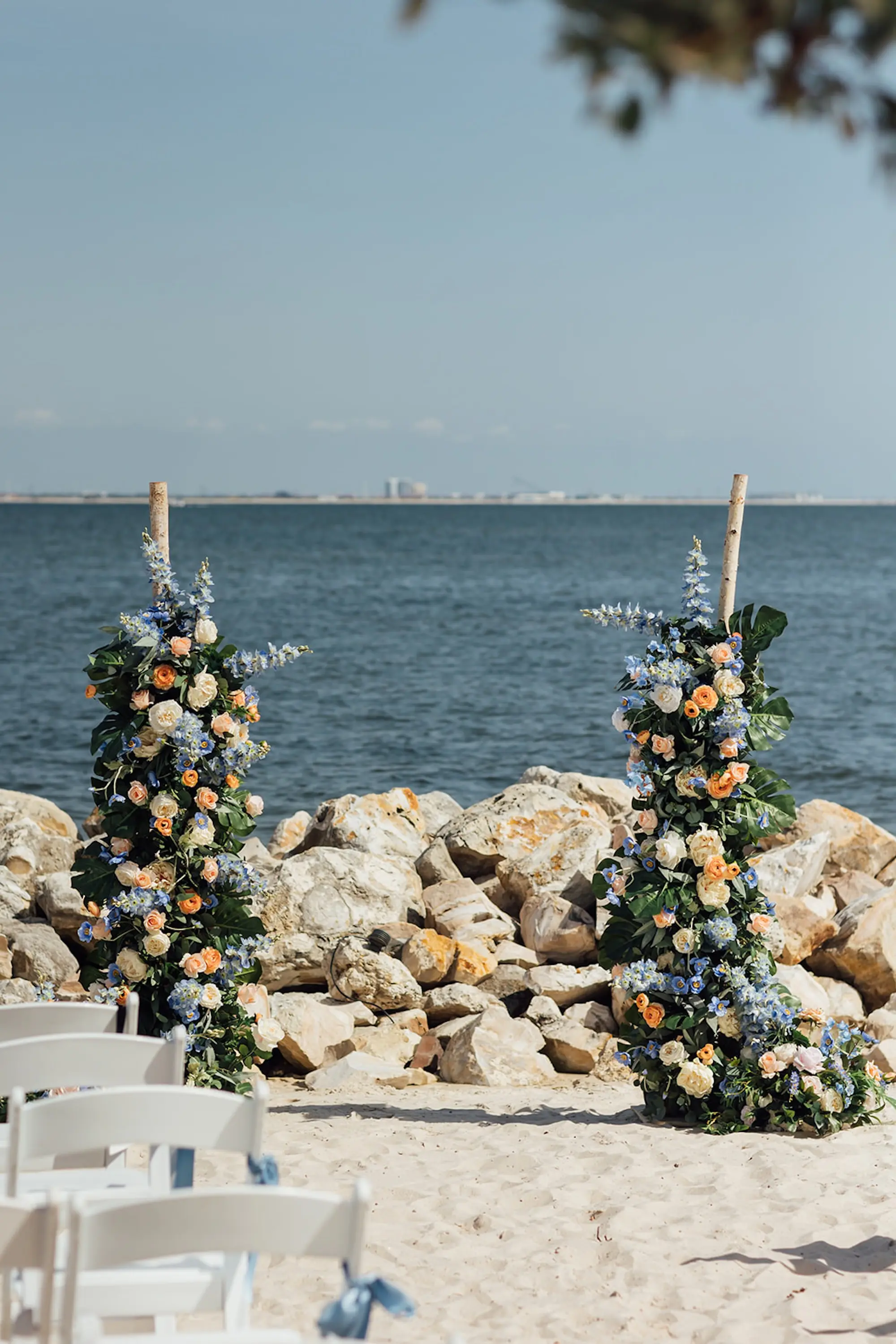 Coastal Peach and Blue Flower Wedding Ceremony Decor Inspiration