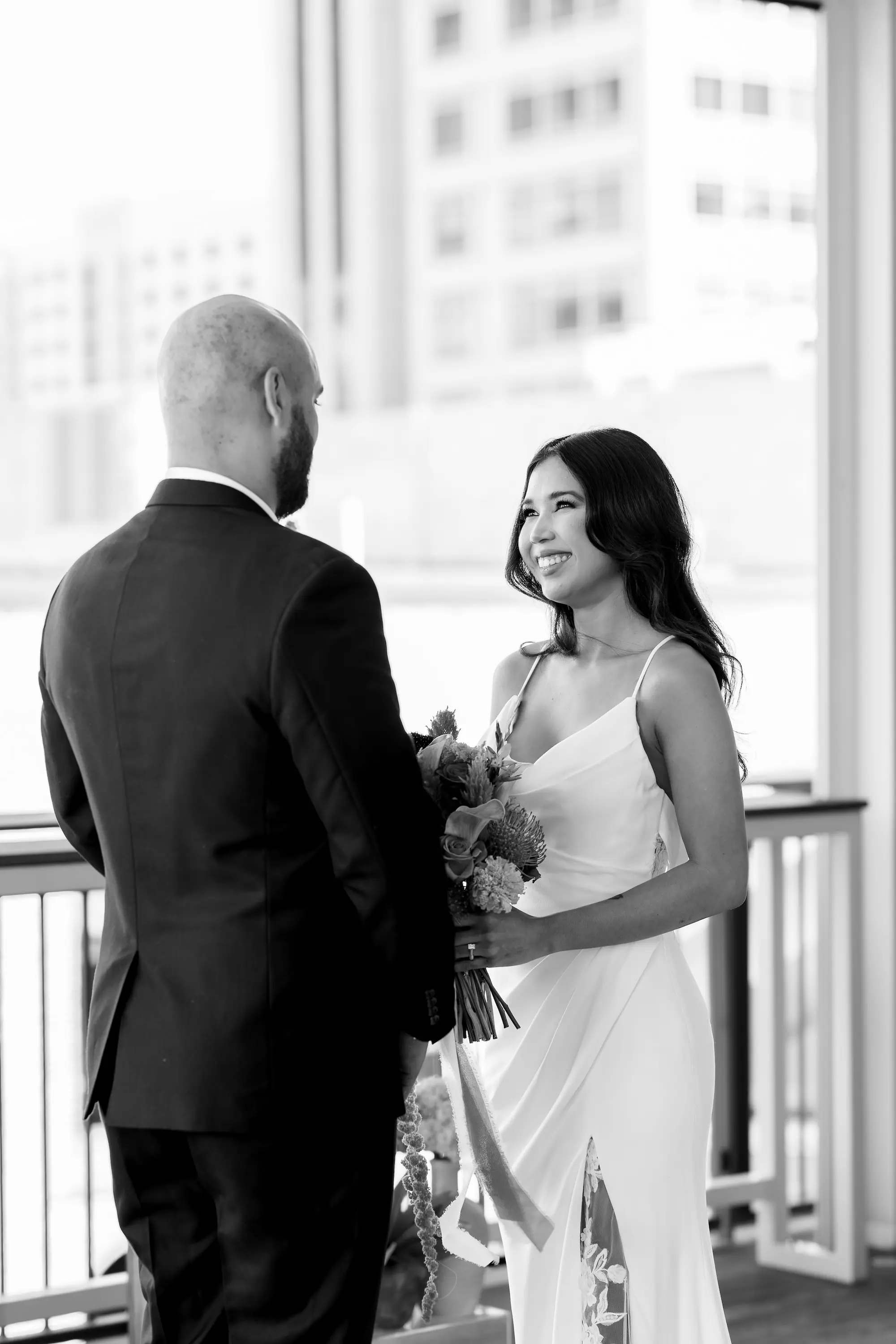 15Vibrant Southwestern Terracotta Pink and Orange Wedding Ideas - Vibrant, Rooftop Wedding Inspiration Shoot | Red Mesa Events Black and White Bride and Groom Wedding Portrait | Fitted, Fit and Flare Wedding Gown with Front Slit with Lace Ideas | Soft Curled Hair with Natural Glam Makeup Inspiration | Tampa Bay Photographer Pine and Forge Photography | Downtown St Pete Event Venue Red Mesa Events | Tampa Bay Boutique Truly Forever Bridal | Sarasota Hair and Makeup Artist Femme Akoi Beauty Studio | Content Creator Behind The Vows