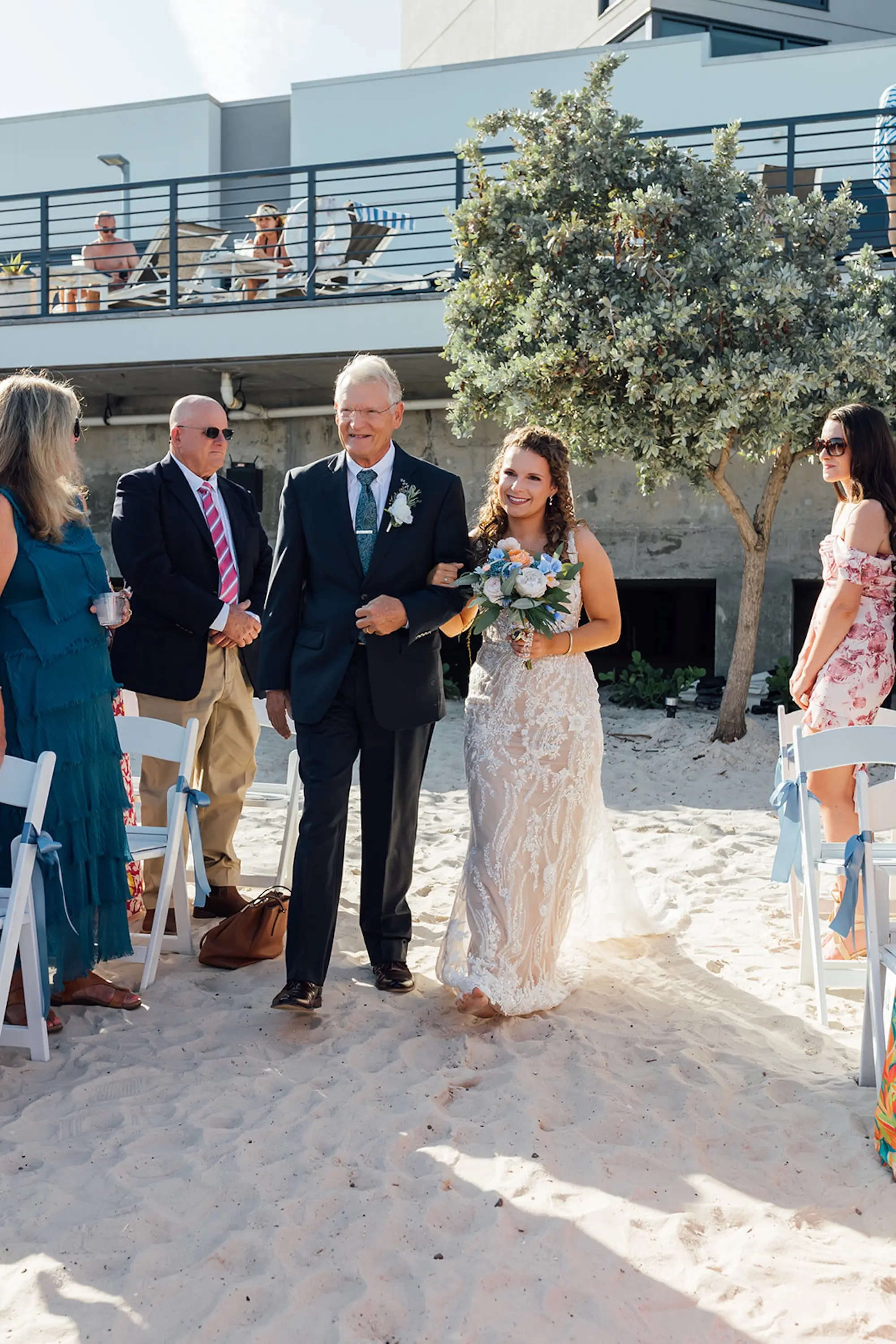 Bride and Father Walking Down Wedding Aisle