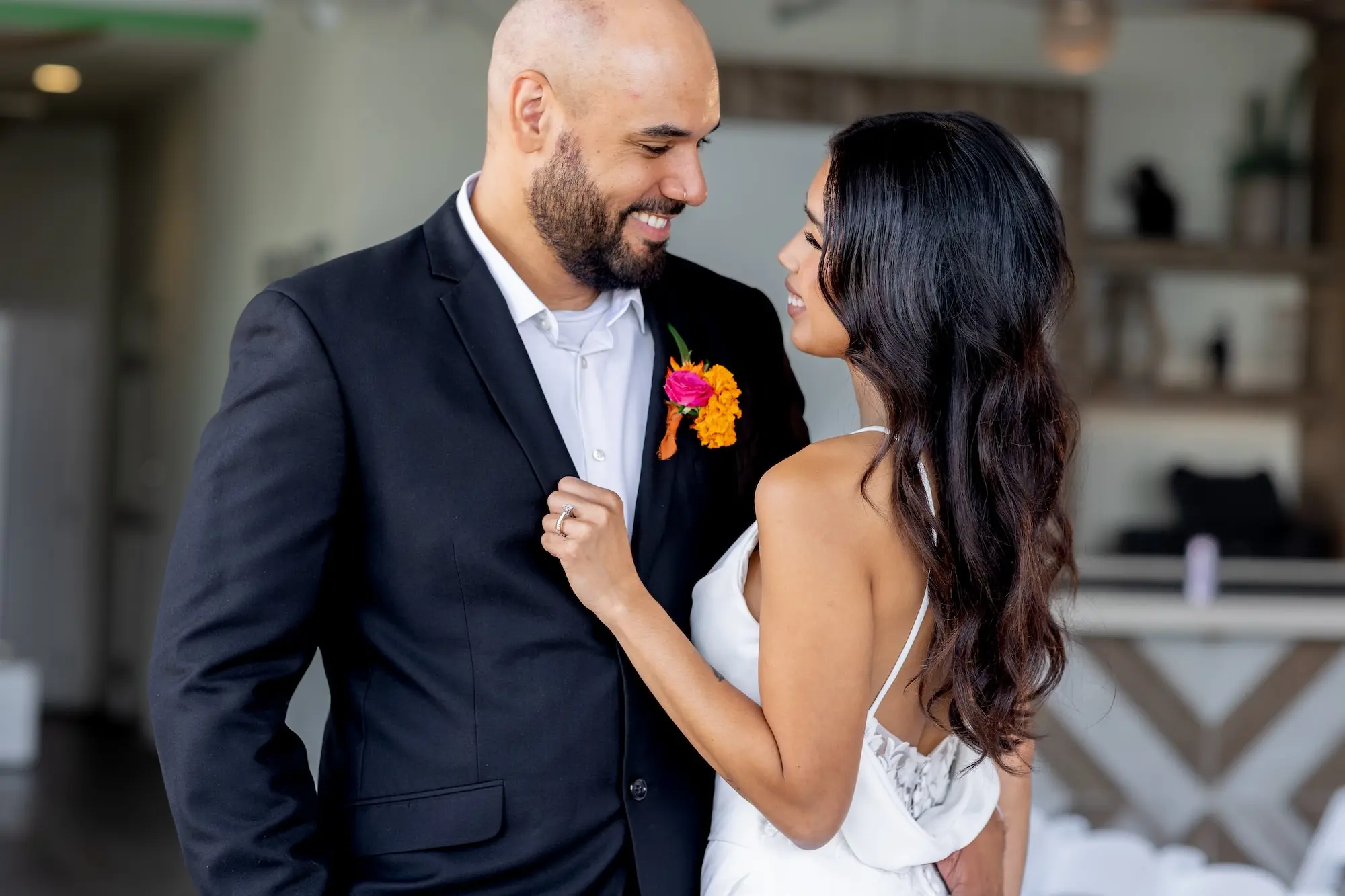 19Vibrant Southwestern Terracotta Pink and Orange Wedding Ideas - Vibrant, Rooftop Wedding Inspiration Shoot | Red Mesa Events Bride and Groom Wedding Portrait | White Fitted, Fit and Flare Wedding Gown with Front Slit with Lace Ideas | Soft Curled Hair with Natural Glam Makeup Inspiration | Tampa Bay Florist Save The Date Florida | Tampa Bay Photographer Pine and Forge Photography | Tampa Bay Boutique Truly Forever Bridal | Sarasota Hair and Makeup Artist Femme Akoi Beauty Studio | Content Creator Behind The Vows