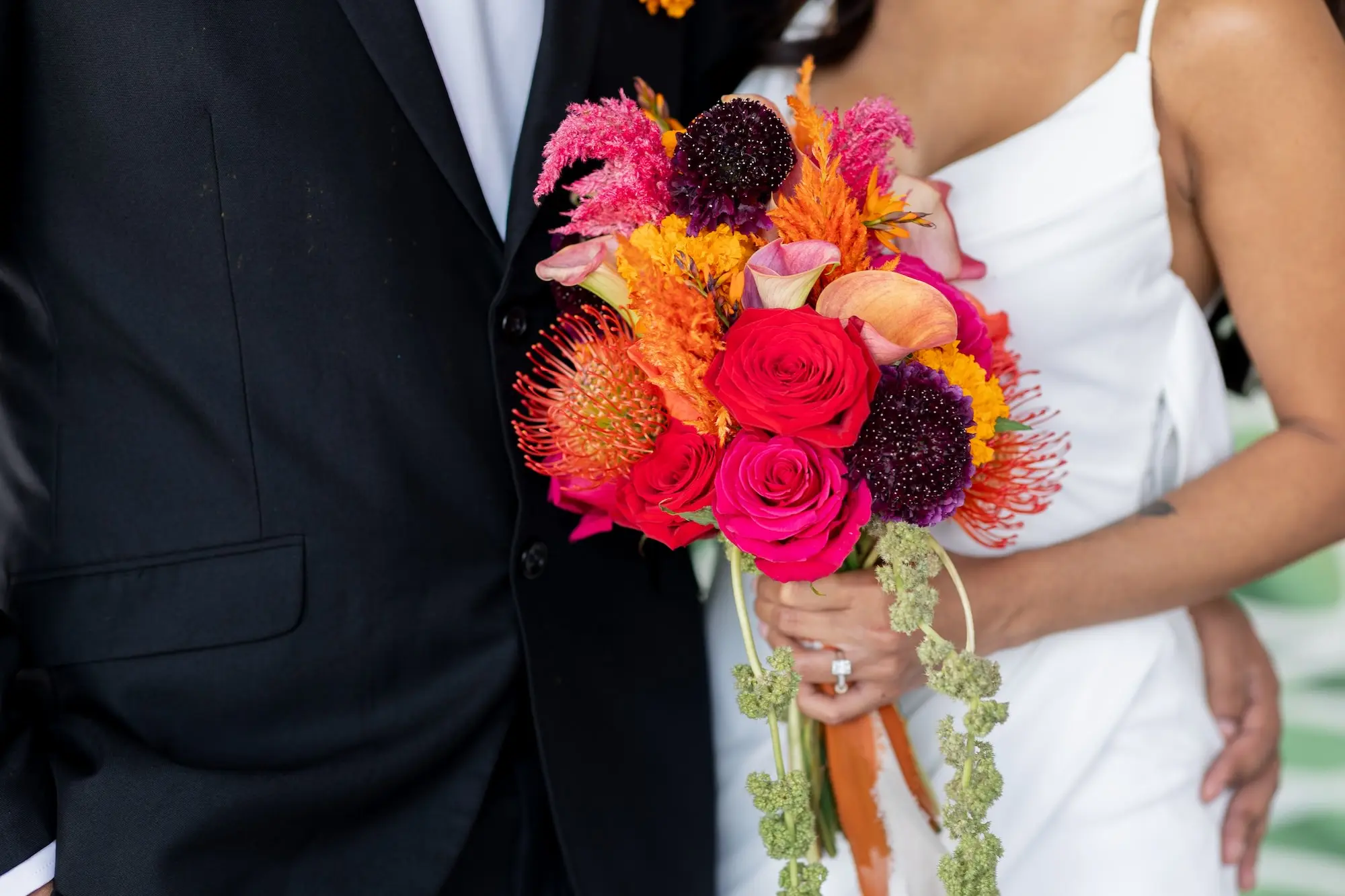 20Vibrant Southwestern Terracotta Pink and Orange Wedding Ideas - Vibrant, Rooftop Wedding Inspiration Shoot | Red Mesa Events Bright Pink, Red, Orange Yellow with Succulent Greenery Bridal Bouquet Inspiration | Tampa Bay Florist Save The Date Florida