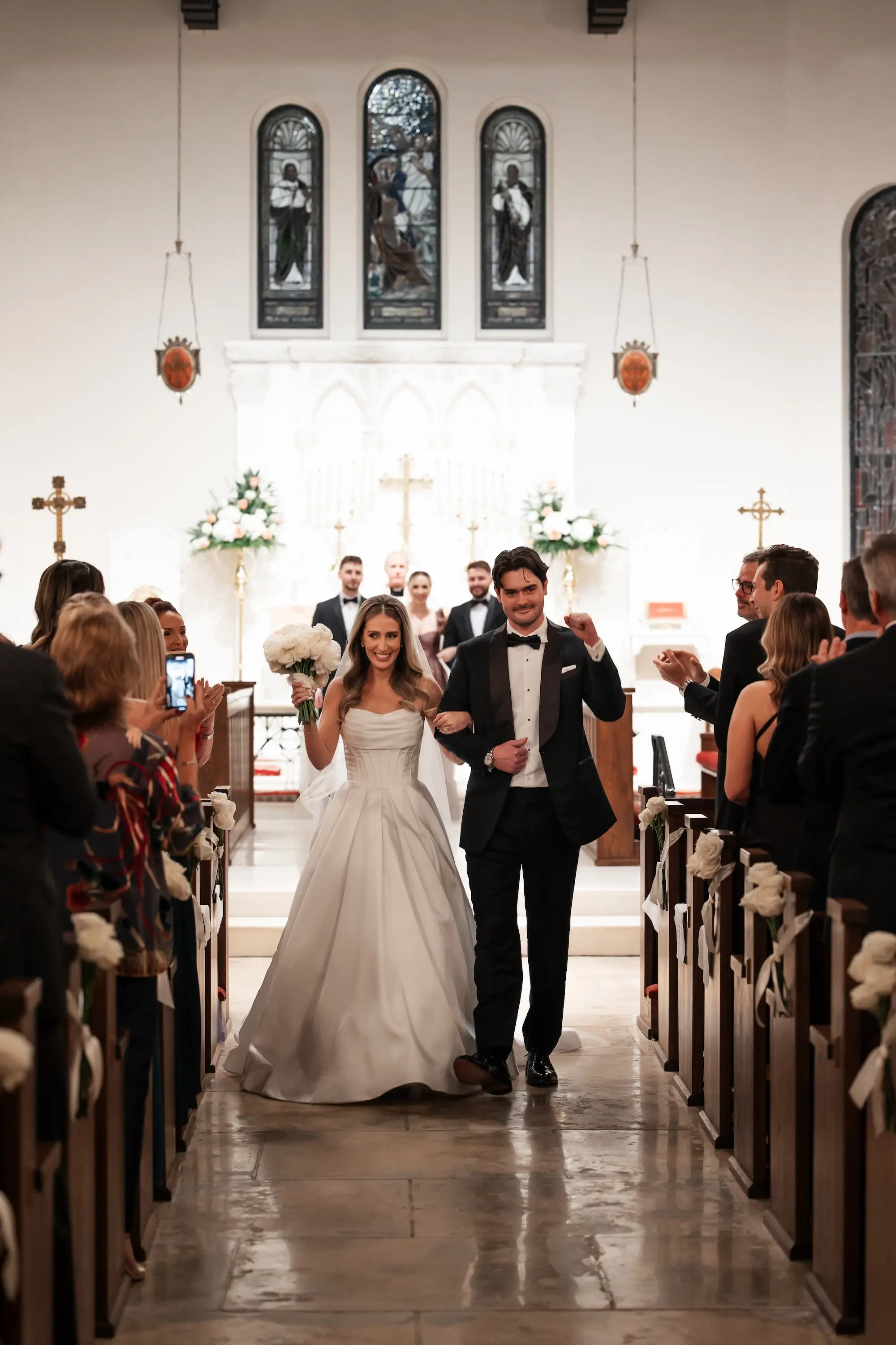 22Modern Black and White Wedding Inspiration - Timeless Black and White Downtown Tampa Wedding | The Vault Bride and Groom Celebration Just Married Wedding Ceremony Aisle Portrait | Monochromatic White Rose Bridal Bouquet Inspiration | Tampa Church Wedding Venue St. Andrew's Episcopal Church