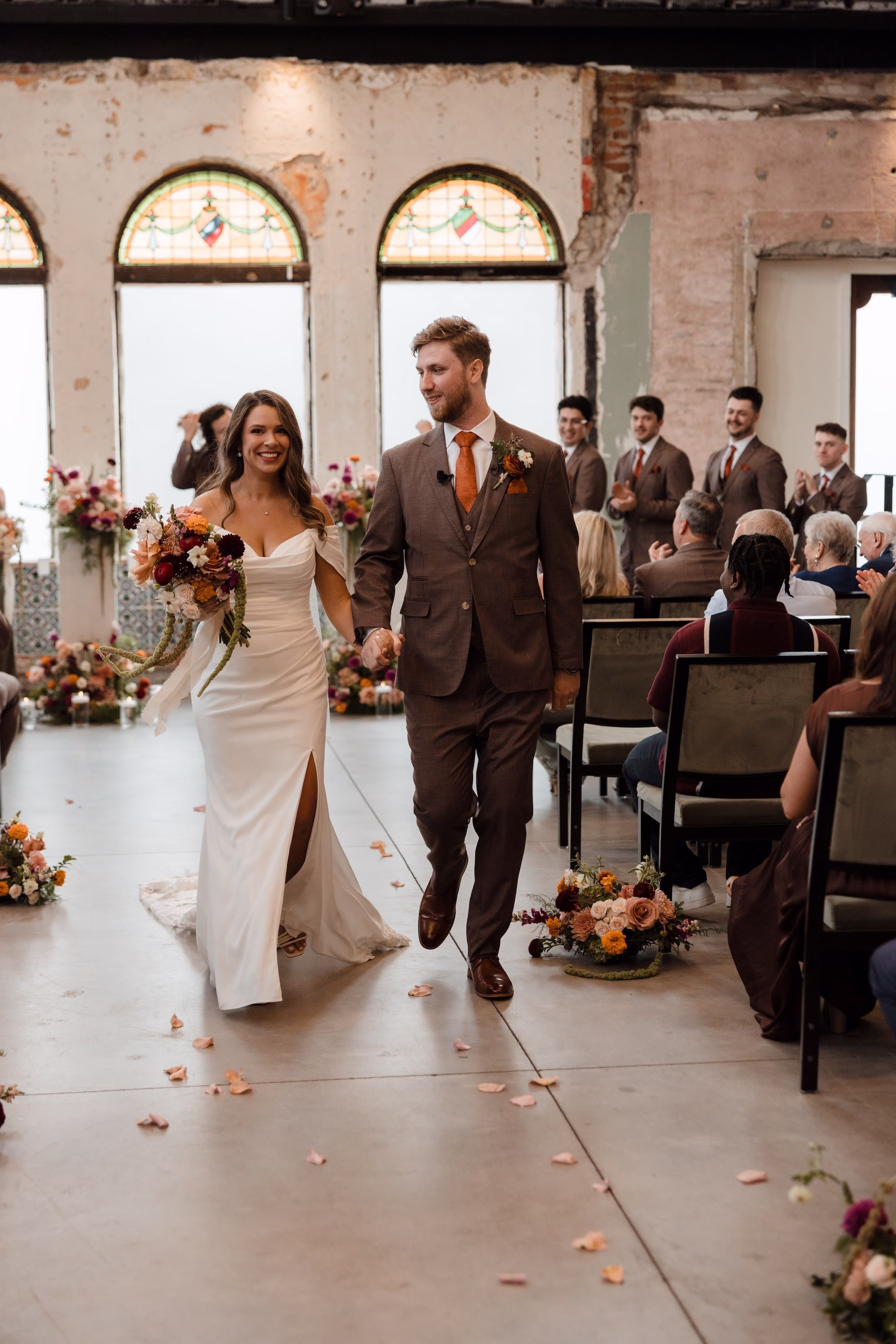 Bride and Groom Just Married Walking Down Wedding Ceremony Aisle Wedding Portrait | Tampa Bay Photographer Evoke Photo and Film | Ybor City Wedding Venue Hotel Haya