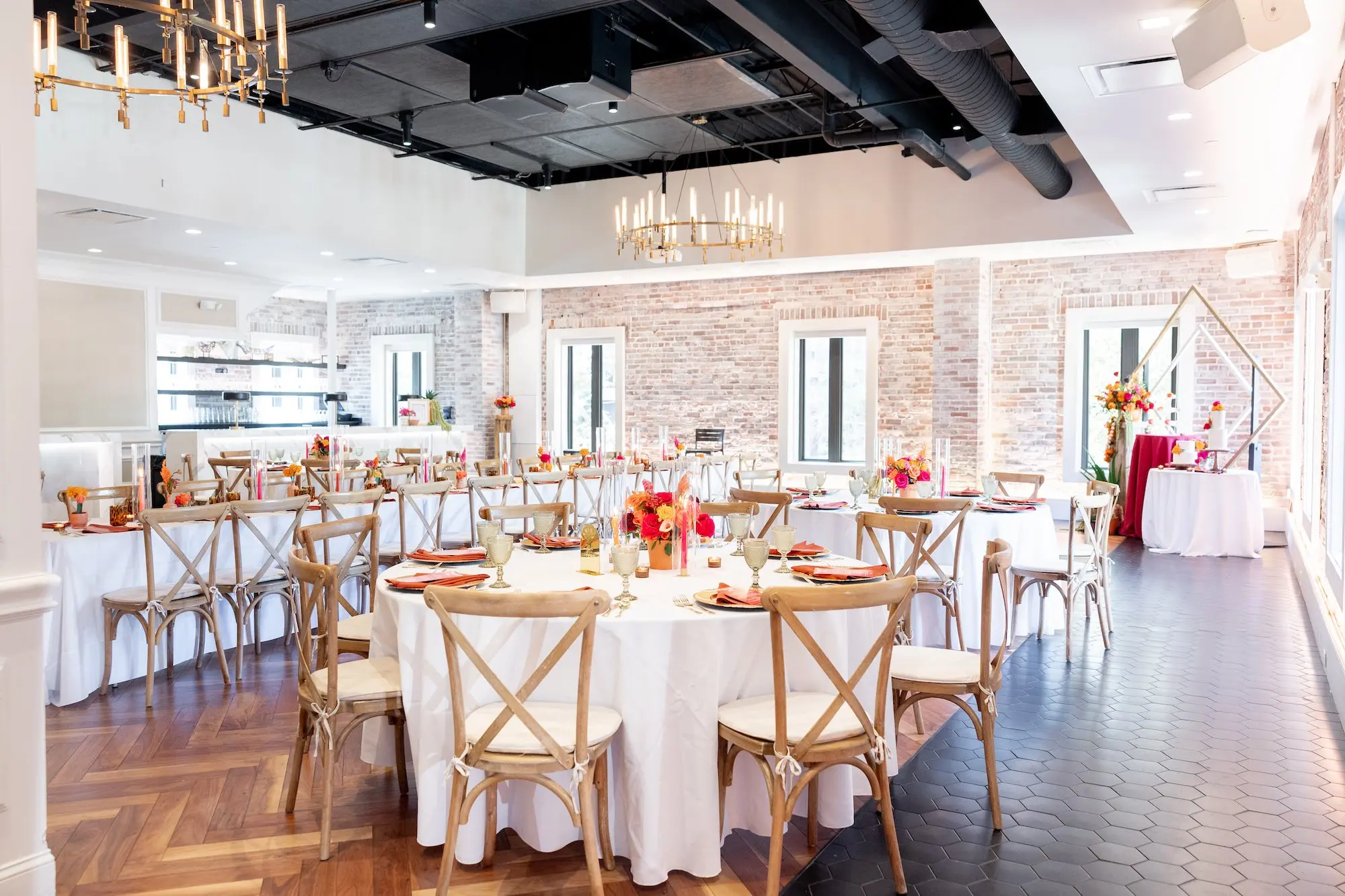 28Vibrant Southwestern Terracotta Pink and Orange Wedding Ideas St Pete Venue Red Mesa Events - Vibrant, Rooftop Wedding Inspiration Shoot | Red Mesa Events Southwestern Ballroom Wedding Reception | Rustic Wooden Chairs | Vibrant Southwest Mexican Wedding Reception Ideas | Bright Pink, Orange, Rust Red, Floral Arrangements Centerpiece Arrangements in Terracotta Pots Reception Decoration Inspiration | Romantic Candlelight Tablescape Ideas | Red Menus on White Linens Inspiration | Tampa Bay Florist Save The Date Florida | St Pete Event Planner Coastal Coordinating | Downtown St Pete Event Venue Red Mesa Events | St Pete Rentals Gabro Event Services