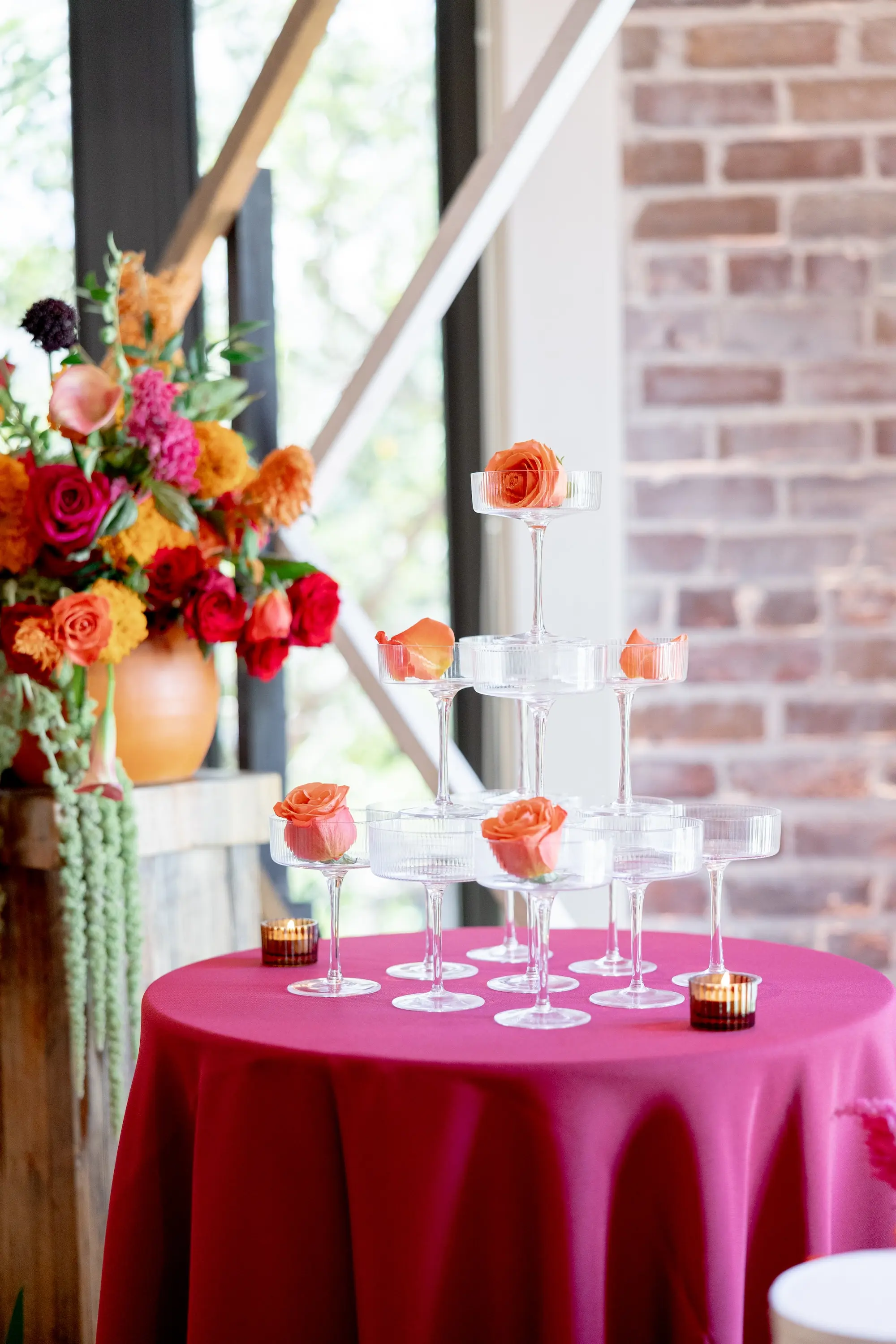 31Vibrant Southwestern Terracotta Pink and Orange Wedding Ideas - Vibrant, Rooftop Wedding Inspiration Shoot | Red Mesa Events Champagne Tower with Orange Roses Wedding Reception Decor Inspiration | Bright Pink Eclectic Linens Ideas | Tampa Bay Florist Save The Date Florida | St Pete Event Planner Coastal Coordinating | Tampa Bay Photographer Pine and Forge Photography | St Pete Rentals Gabro Event Services