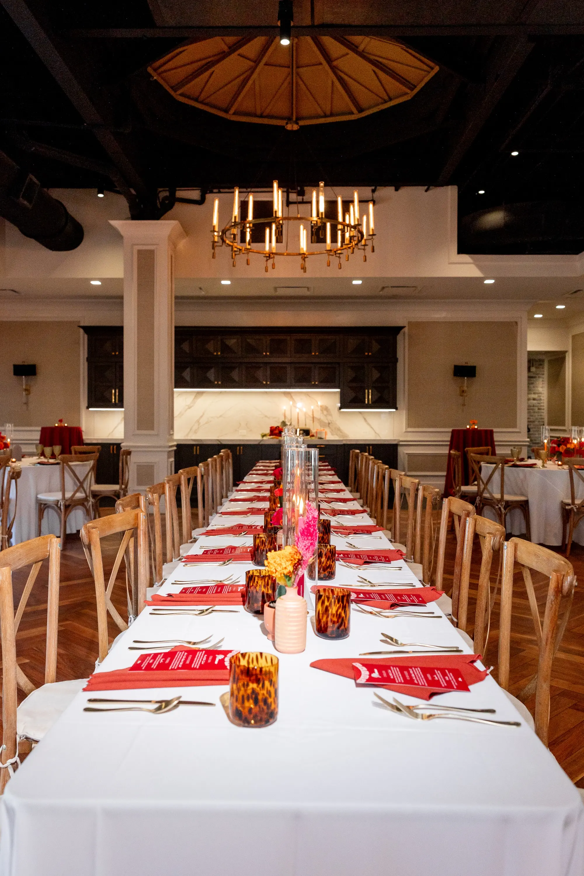33Vibrant Southwestern Terracotta Pink and Orange Wedding Ideas - Vibrant, Rooftop Wedding Inspiration Shoot | Red Mesa Events Southwestern Ballroom Wedding Reception | Rustic Wooden Chairs | Vibrant Southwest Mexican Wedding Reception Ideas | Bright Pink, Orange, Rust Red, Floral Arrangements Centerpiece Arrangements in Terracotta Pots Reception Decoration Inspiration | Romantic Candlelight Tablescape Ideas | Red Menus on White Linens Inspiration | Tampa Bay Florist Save The Date Florida | St Pete Event Planner Coastal Coordinating | Downtown St Pete Event Venue Red Mesa Events | St Pete Rentals Gabro Event Services
