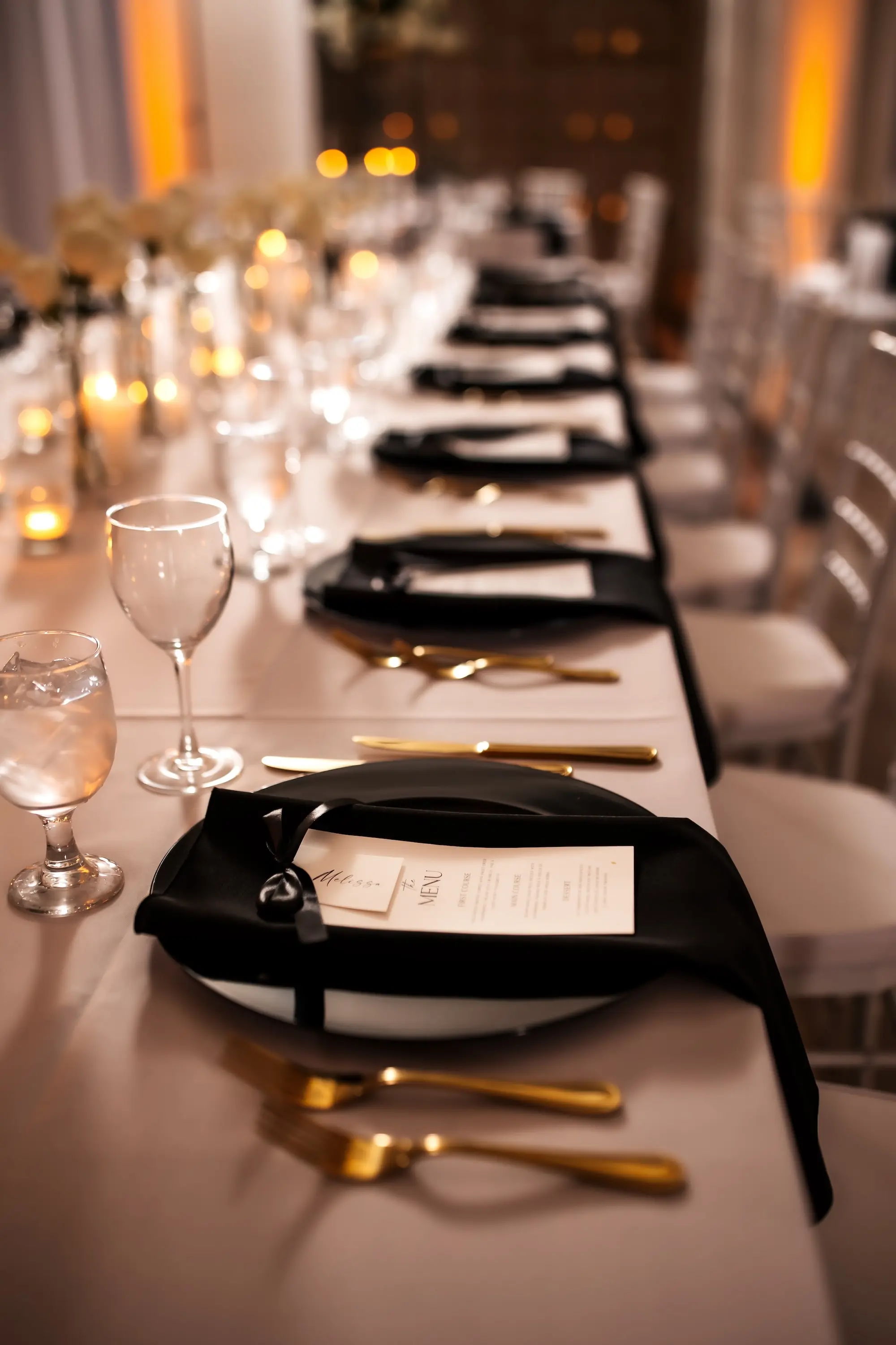 34Modern Black and White Wedding Inspiration - Timeless Black and White Downtown Tampa Wedding | The Vault Timeless White Linens with Gold Flatware and Black Napkins with White Menu Card Tablescape Wedding Reception Decor Inspiration | Kate Ryan Event Rentals