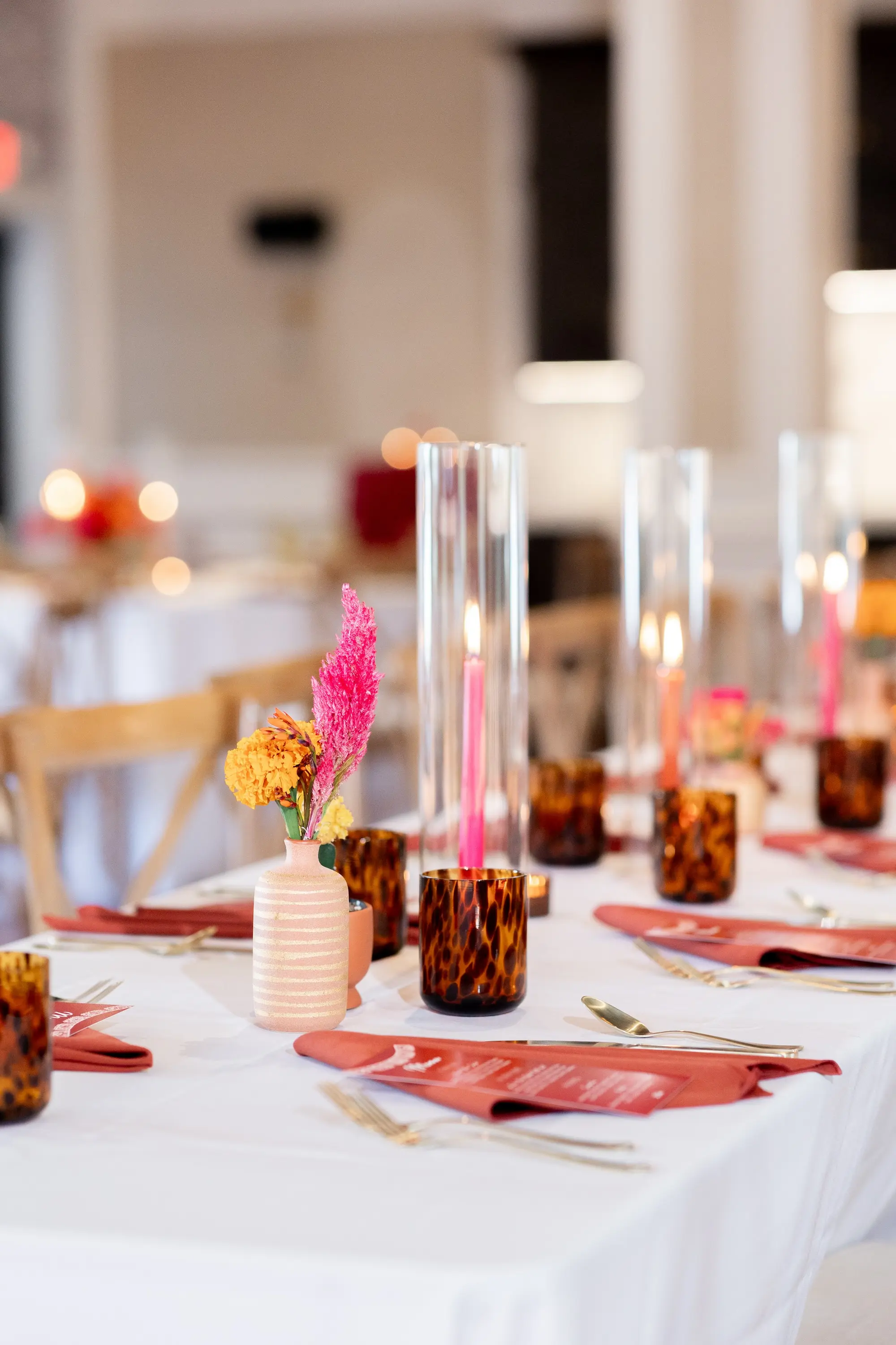 34Vibrant Southwestern Terracotta Pink and Orange Wedding Ideas - Vibrant, Rooftop Wedding Inspiration Shoot | Red Mesa Events Southwestern Ballroom with Textured Brick Wall Wedding Reception | Vibrant Southwest Mexican Wedding Reception Ideas | Bright Pink, Orange, Rust Red Florals in Terracotta Bud Vases Arrangements Centerpiece Reception Decor Inspiration | Bold Pink Taper Candles and Tea Candles Romantic Tablescape Decor Ideas | Tampa Bay Florist Save The Date Florida | St Pete Event Planner Coastal Coordinating | St Pete Rentals Gabro Event Services